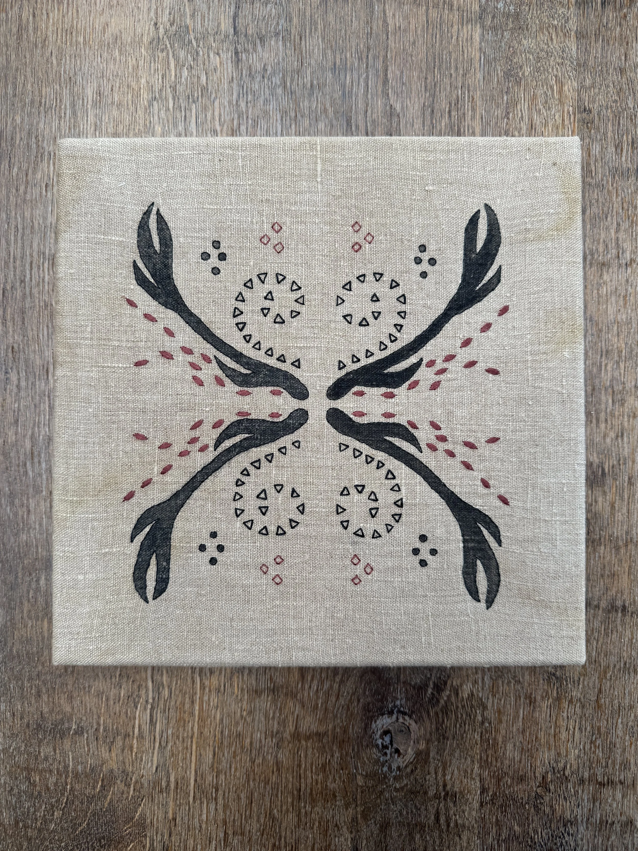 Linen textile hand painted in oak gall ink and hand embroidered in elemental pattern stretched canvas