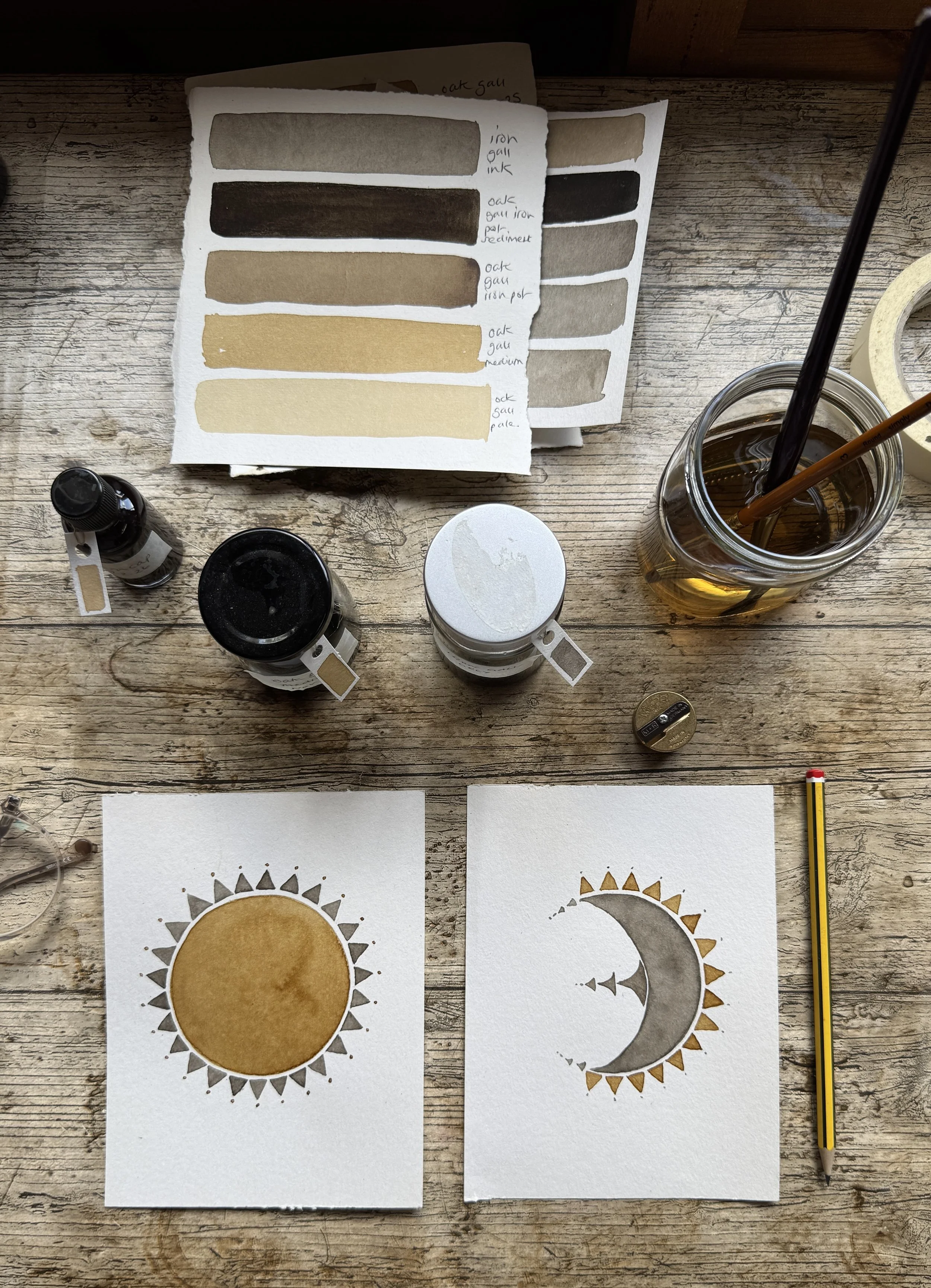 Artwork sun and moon motifs hand painted in natural oak gall inks