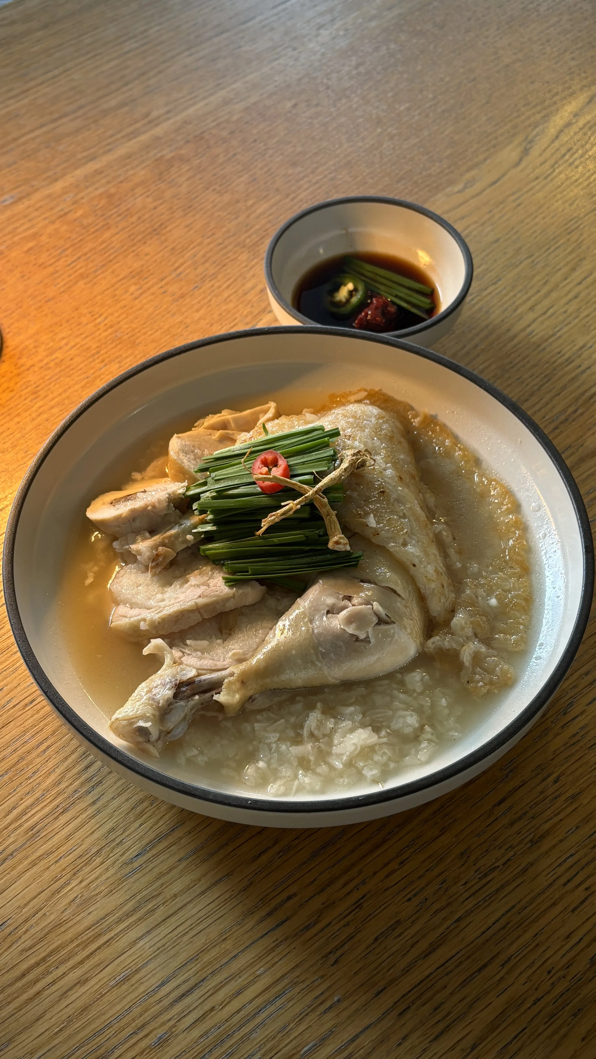 Ginseng chicken with crispy scorched rice, chives and ginseng broth at Misty Pot Korean in West Melbourne.