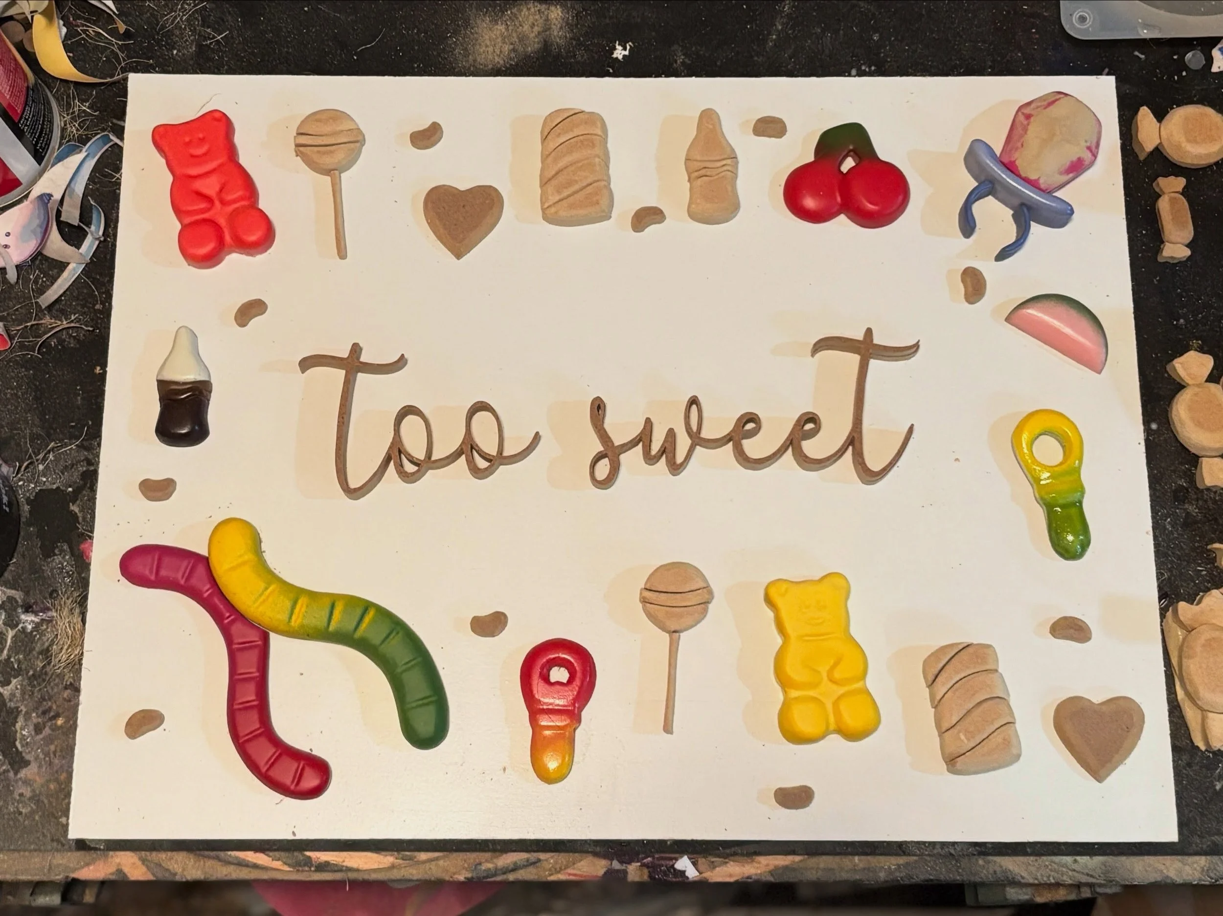 Not much of an update from this weekend other than &ldquo;Too Sweet&rdquo; was the ultimate choice. 

Extra candies: cut and sanded
Sprinkles: first coat of paint down
New cupcake: primed

This week: finish painting, maybe build the frame, inevitably