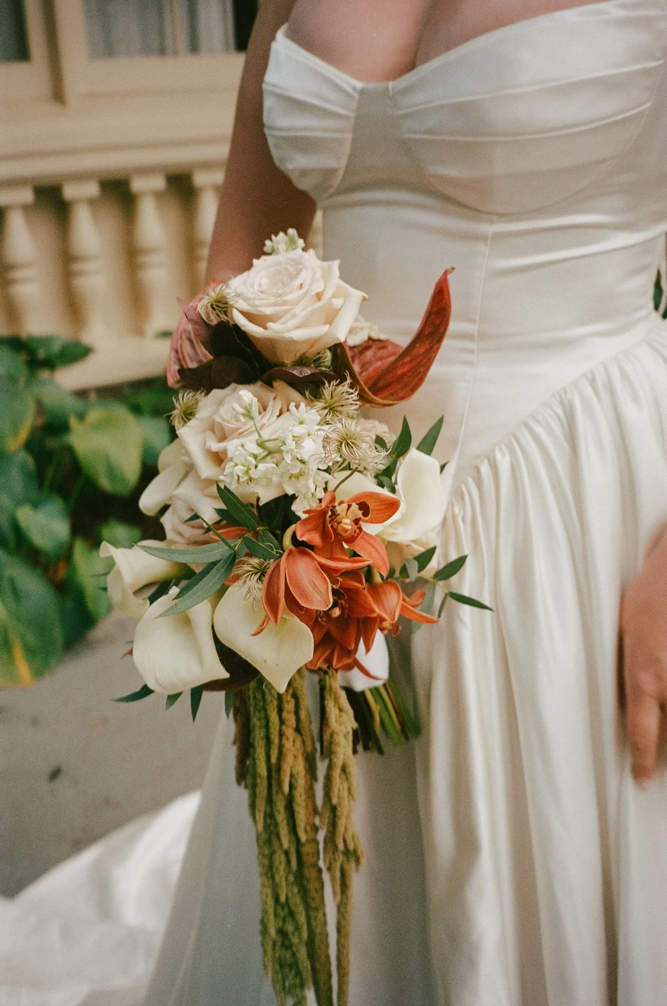 teracota and green cascading bouquet with green hanging amaranthus by Love Letter Florals and Events in Seattle at Lairmont Manor