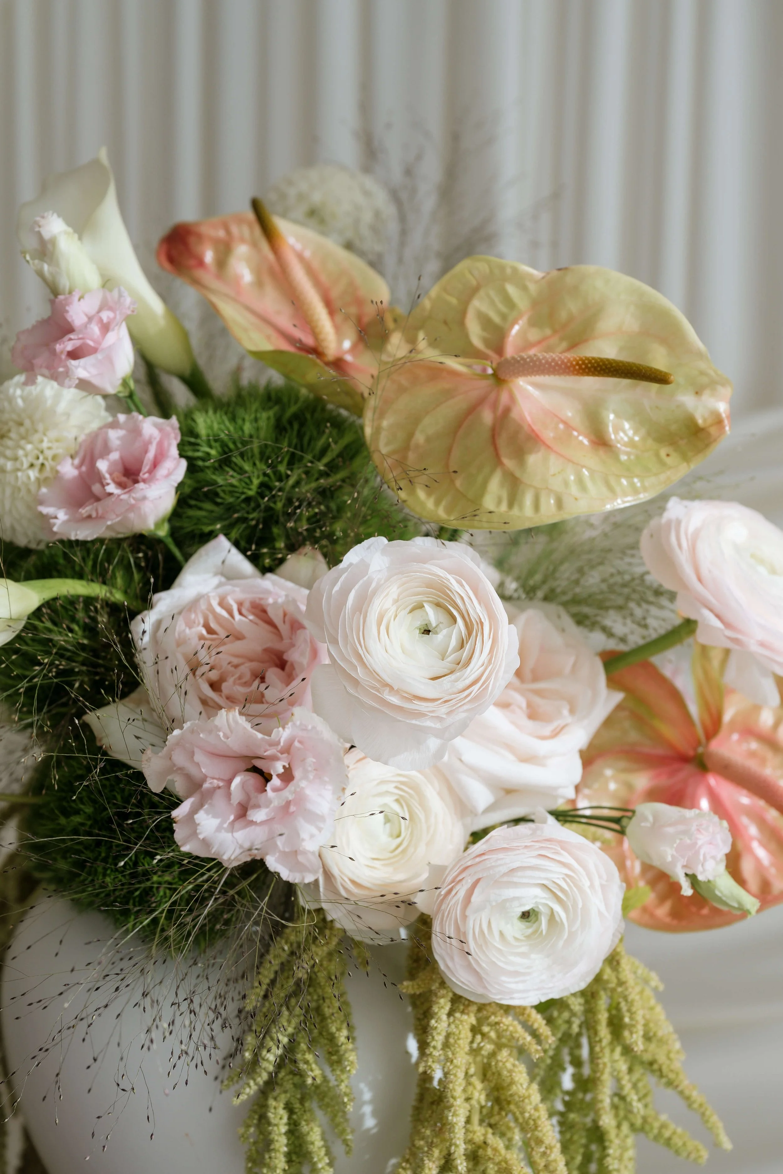 modern blush and burgundy florals with Anthurium and ranunculus  by Love Letter Florals & Events Seattle wedding florist and planner