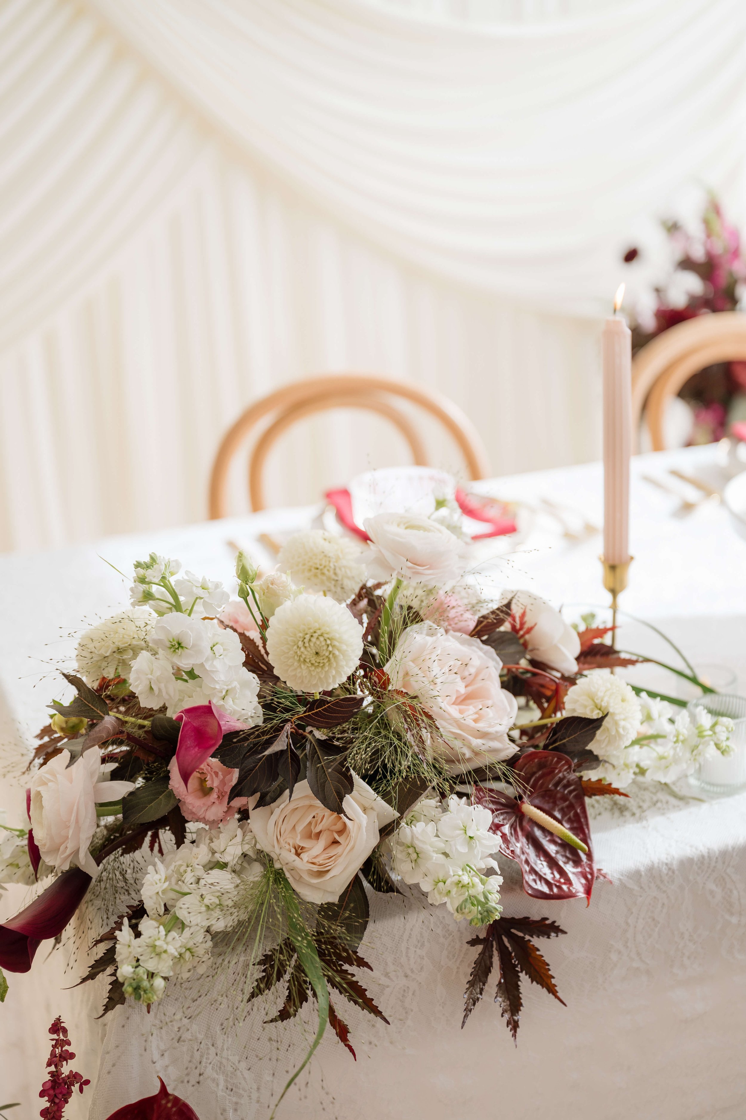 Modern blush and burgundy florals at Seattle wedding hall by Love Letter Florals 