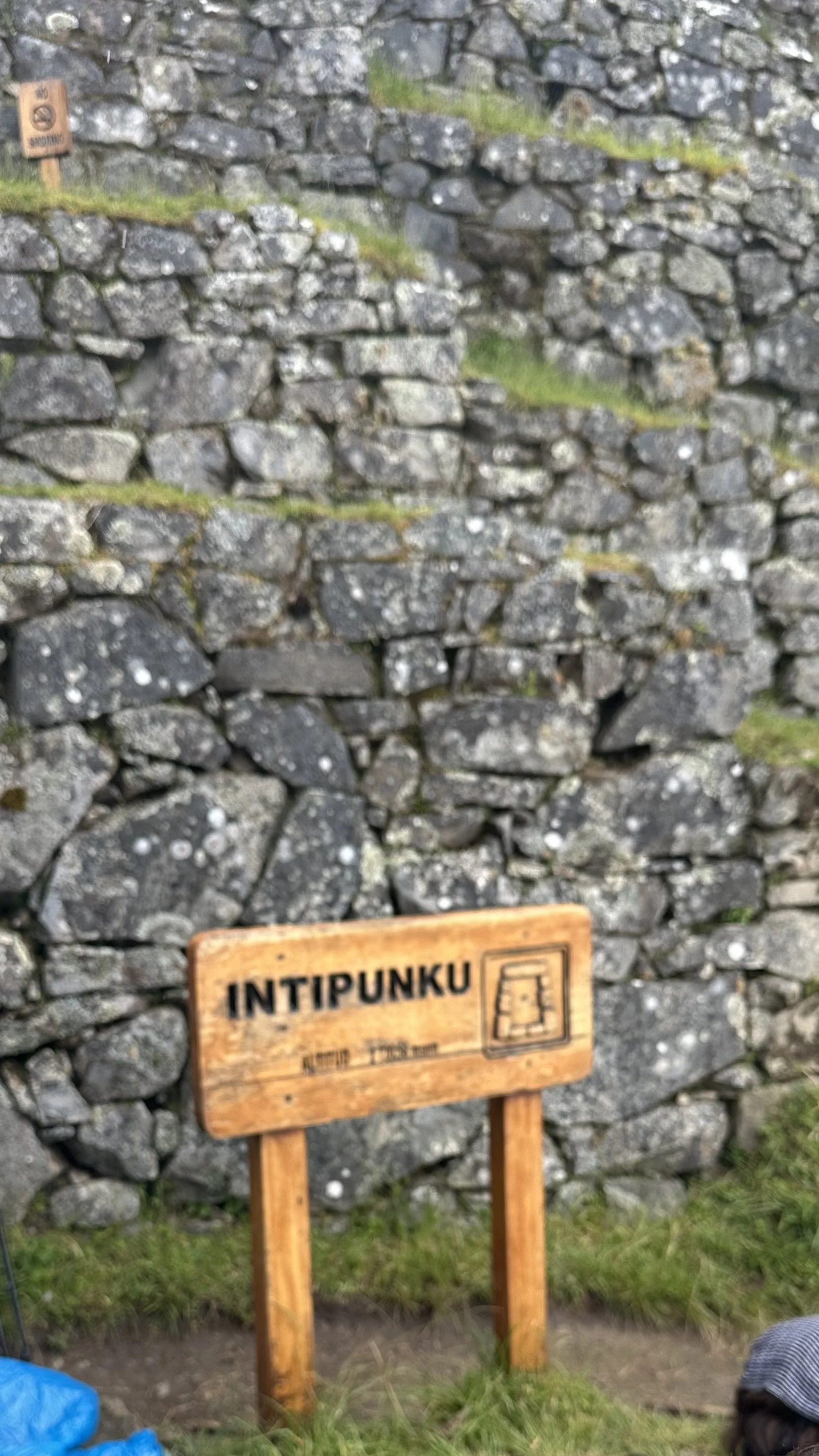 Intipunku Sun Gate sign, first view of Machu Picchu