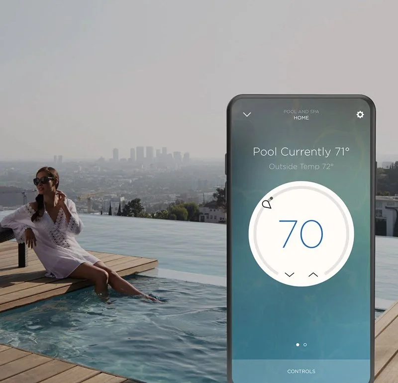 Smartphone showing pool temperature controls with a woman relaxing in a pool and city skyline in the background.