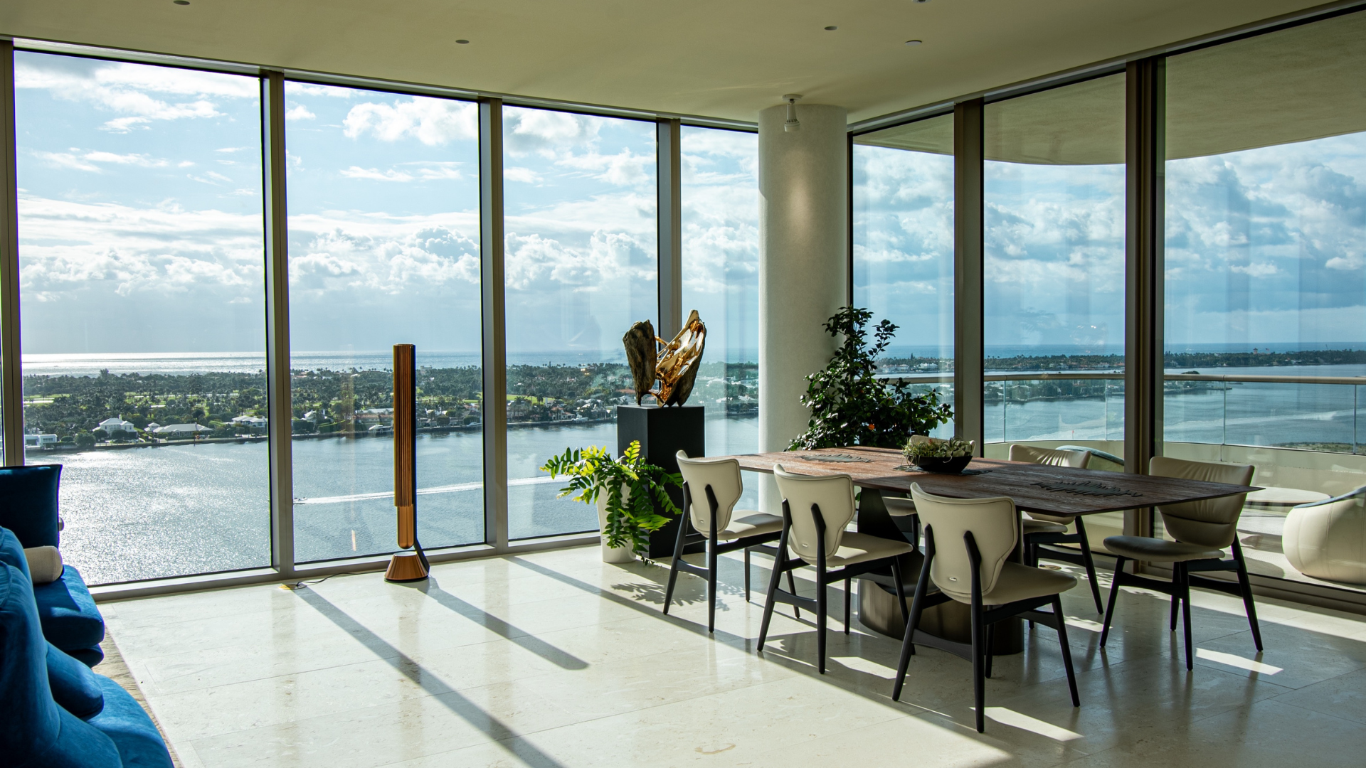 Dining room facing the Intracoastal, where daylight and artificial light are balanced through the day