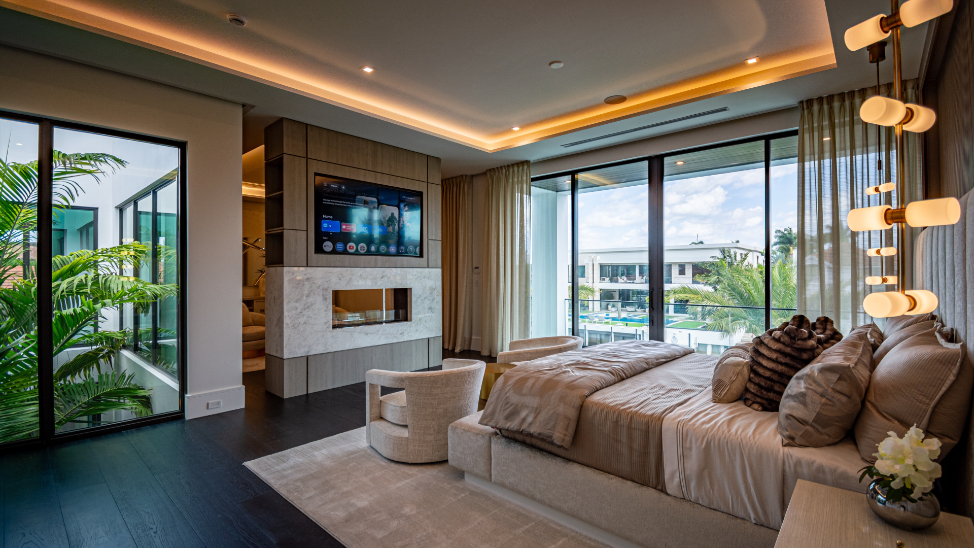 Primary suite with control at the bedside and lighting that shifts for the hour
