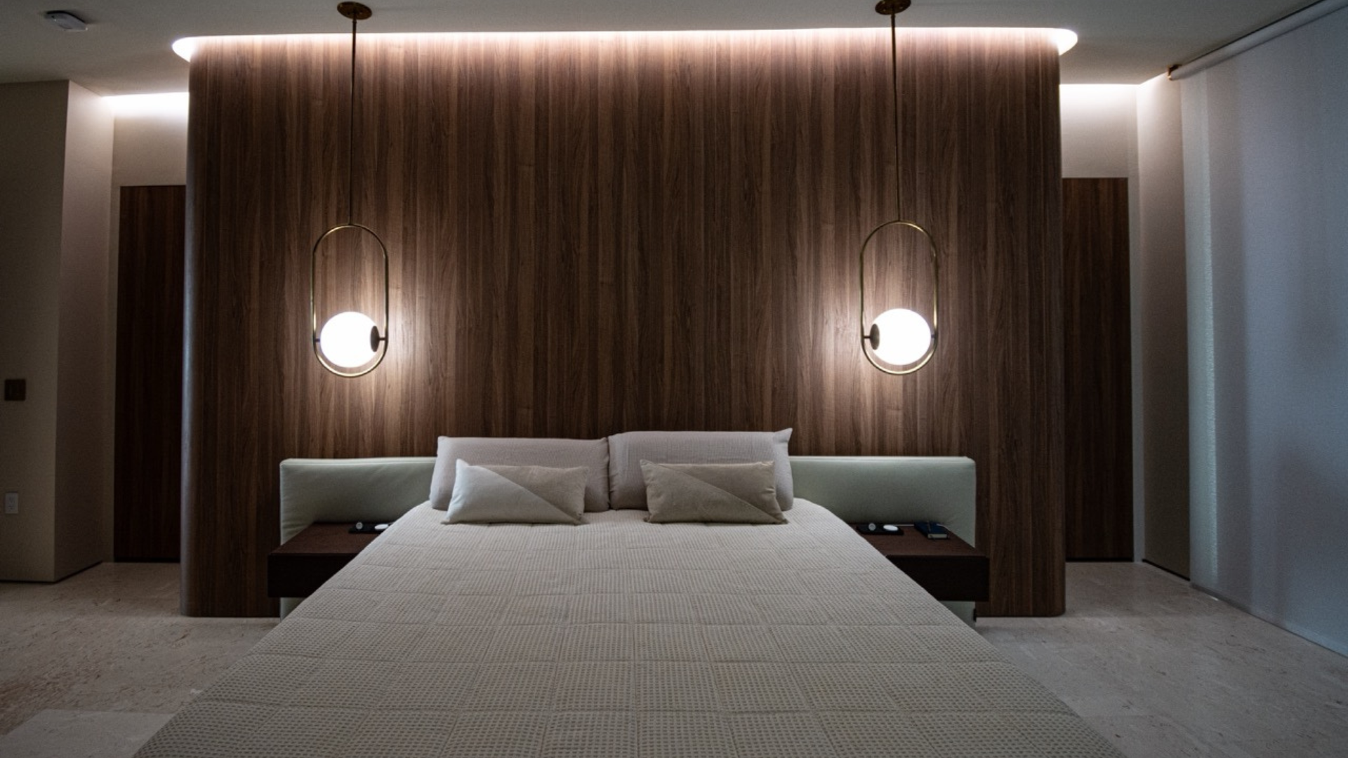 The same bedroom earlier in the day, cool and bright before the light gradually shifts