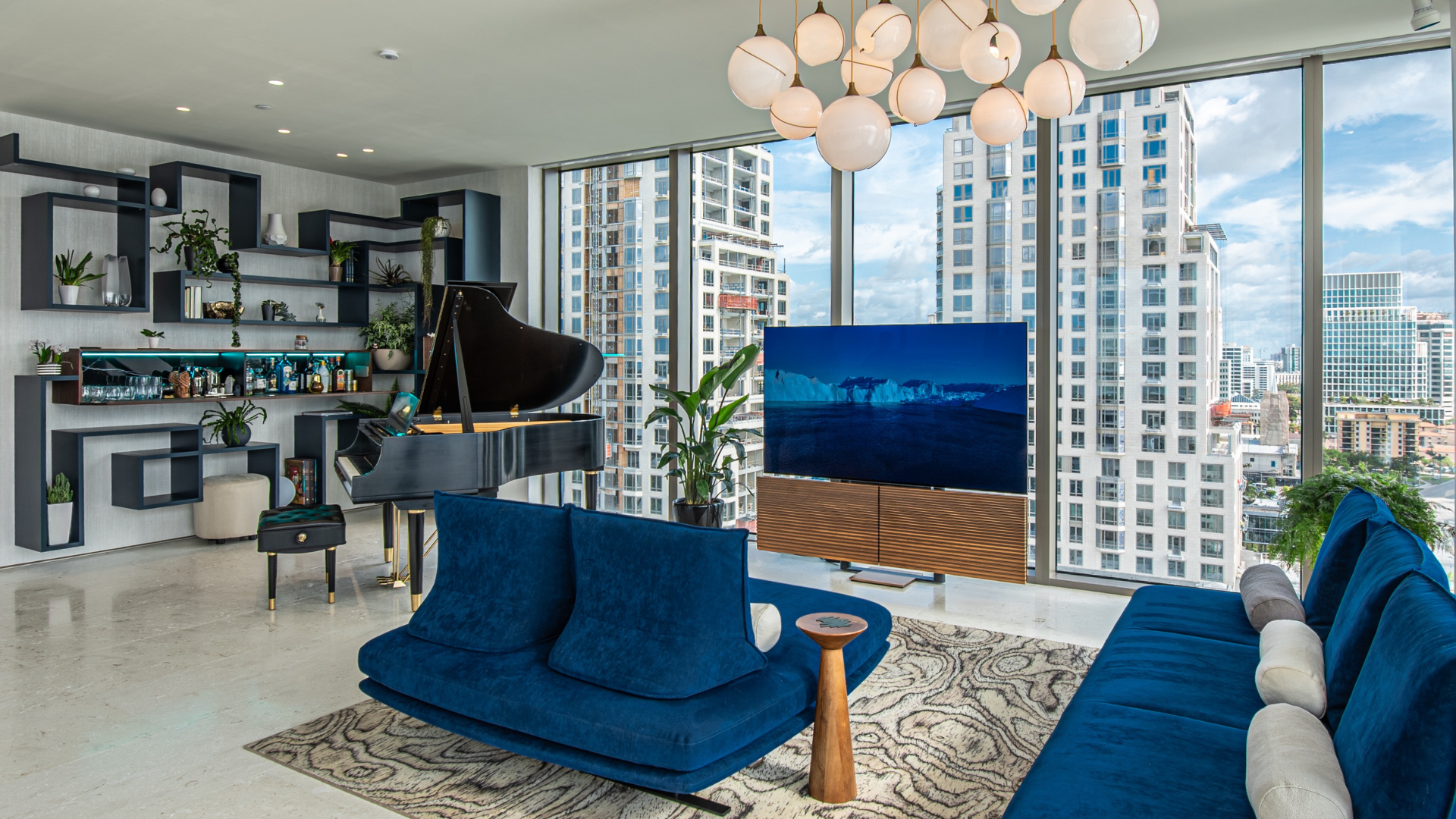 Great room with grand piano and tunable lighting, overlooking downtown West Palm Beach