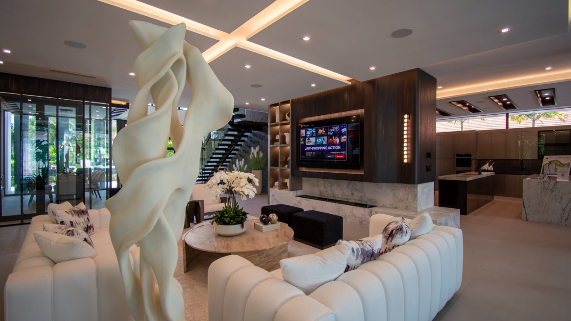Living room where audio, video, and lighting were coordinated with the millwork before it was built