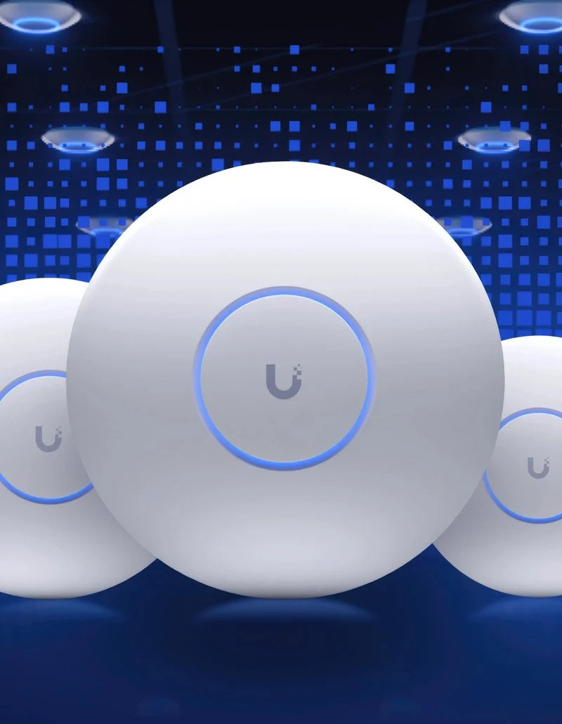 Several spherical devices with a U-shaped logo and glowing blue ring, set against a dark background with blue digital pixel patterns.