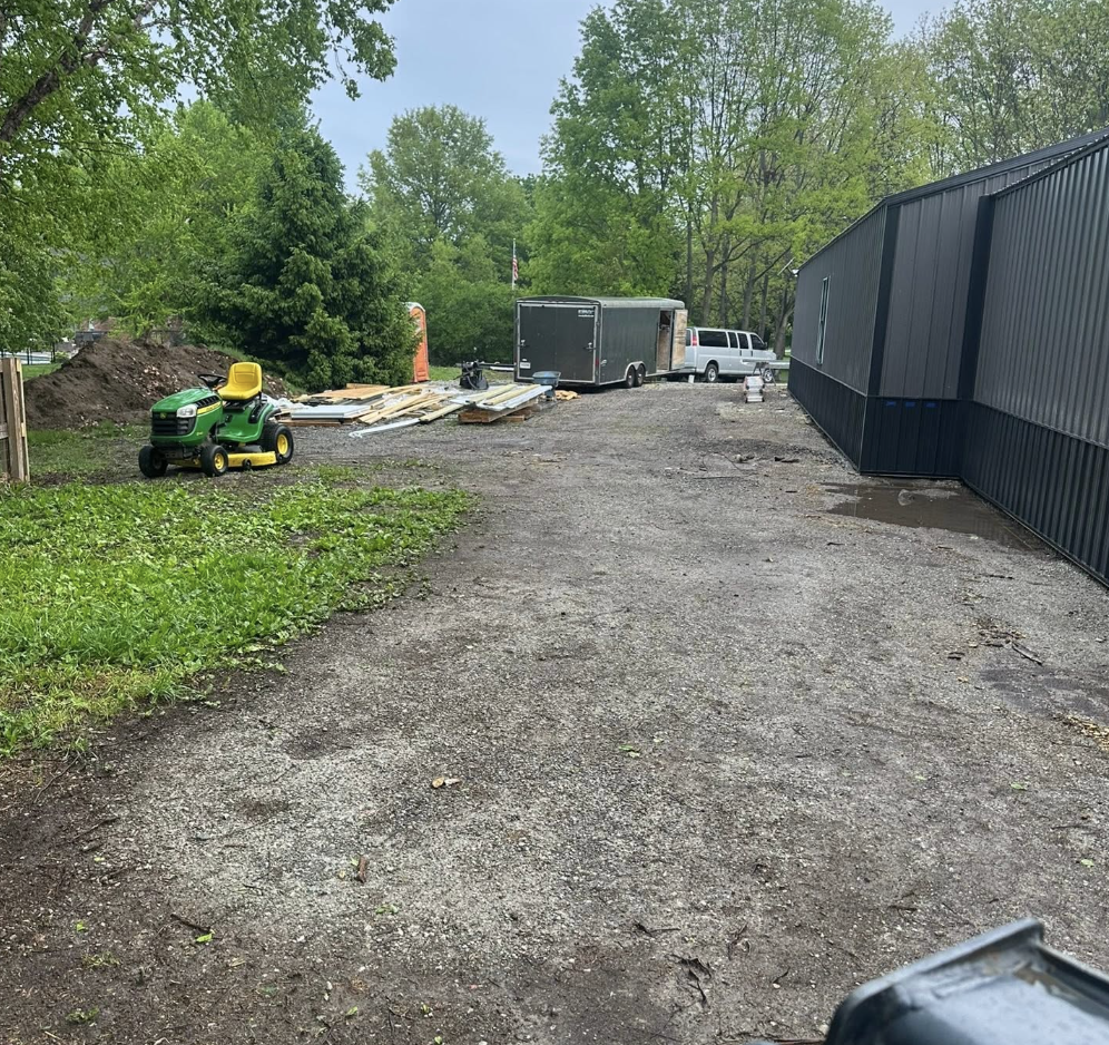 On Grade LLC excavation equipment completing residential site preparation in Central Indiana