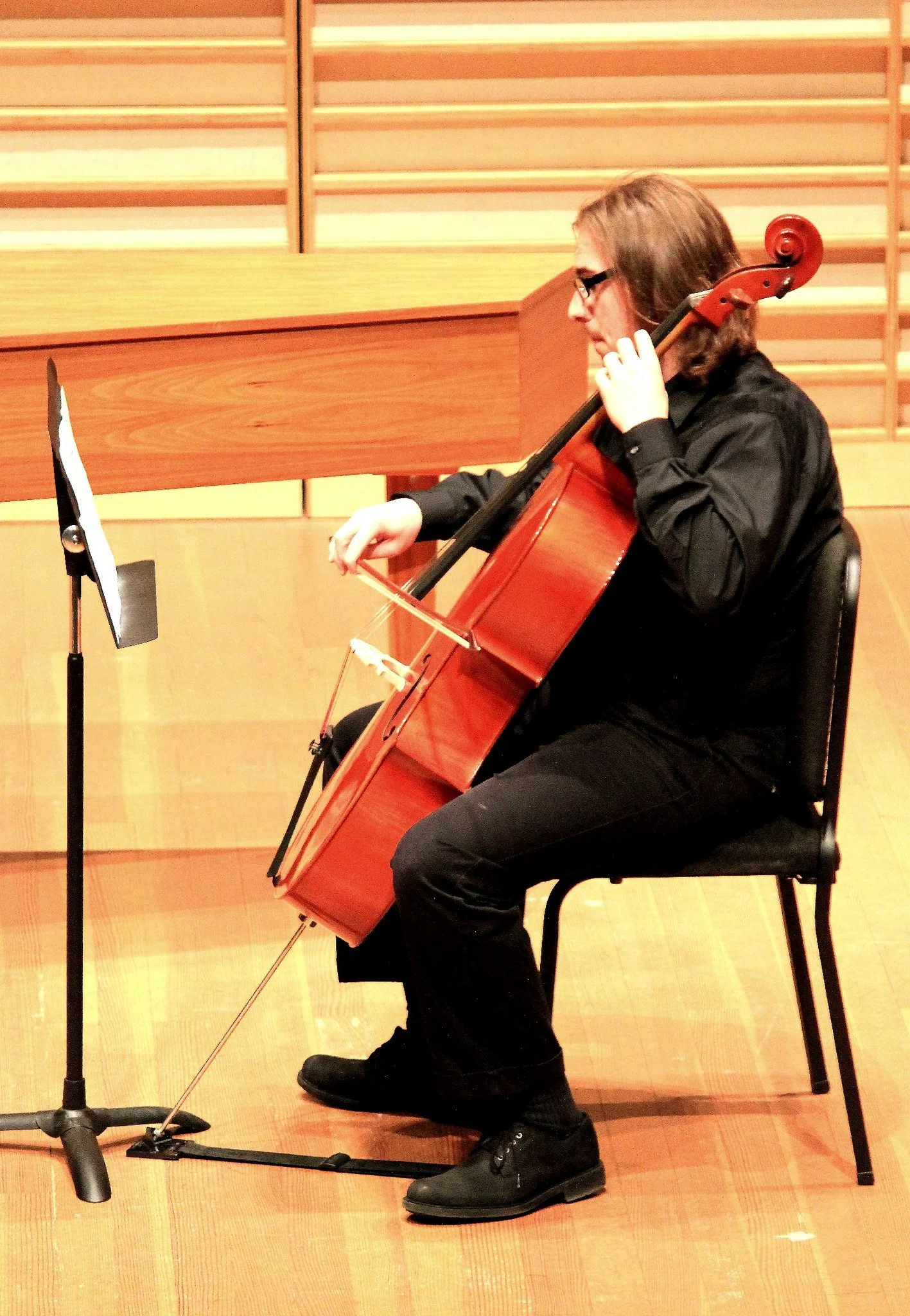 Arthur playing a cello