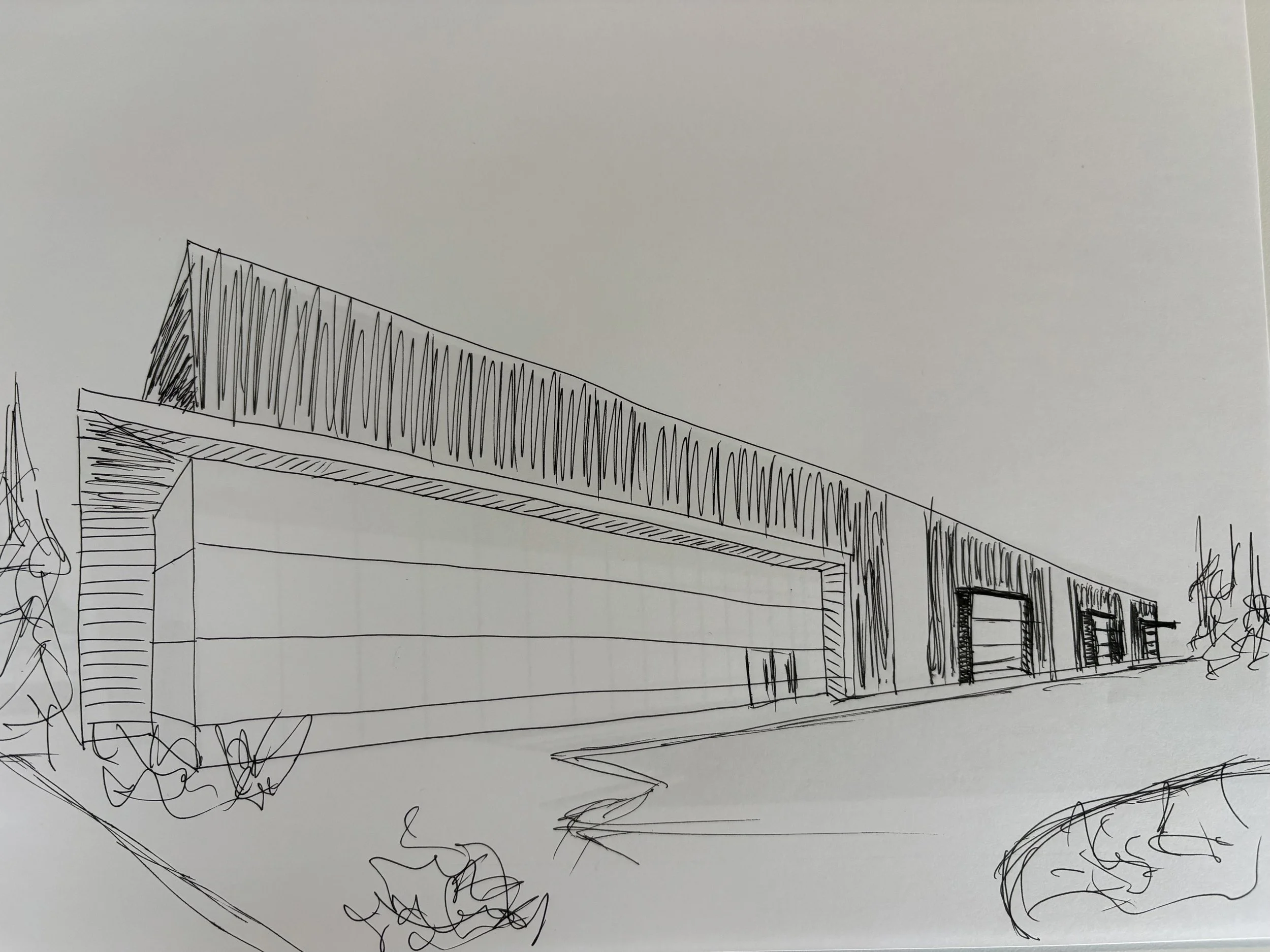 A hand-drawn architectural sketch of a building with a sloped roof and a staircase on the left side, surrounded by some abstract lines and shapes.