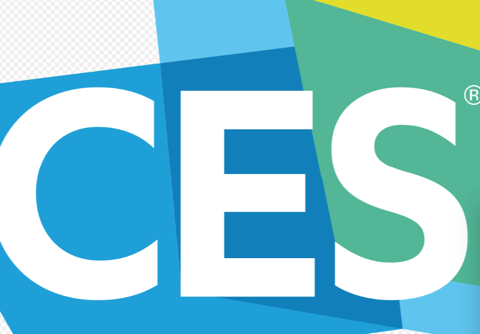Close-up of the colorful CES logo, with large white letters C, E, and S on a background of blue, green, and yellow geometric shapes.