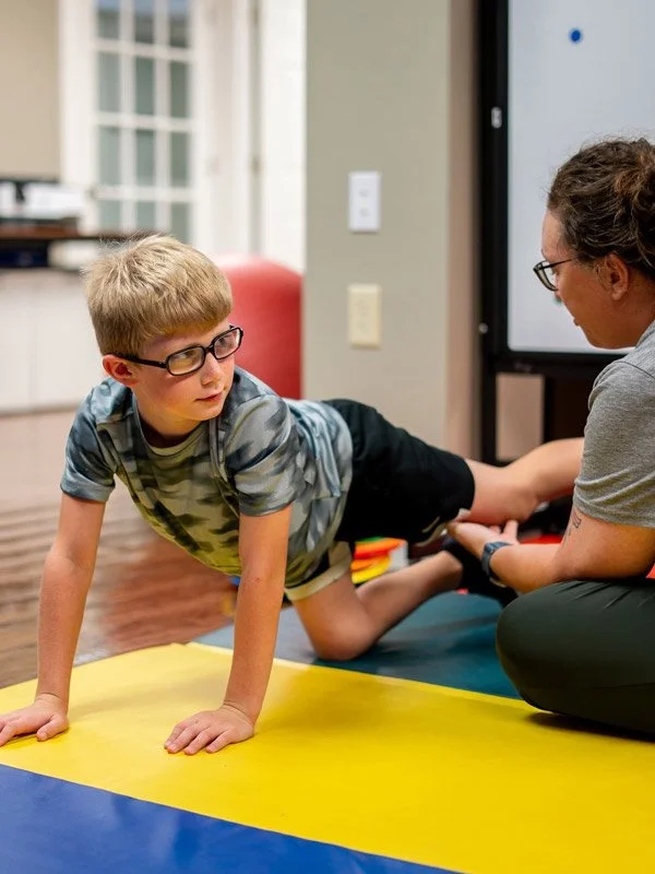 Boy practicing balance therapy | Vision Development Center