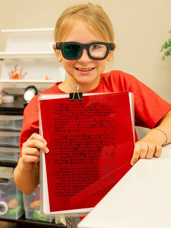 Girl showing Tracking Assessment | Vision Development Center