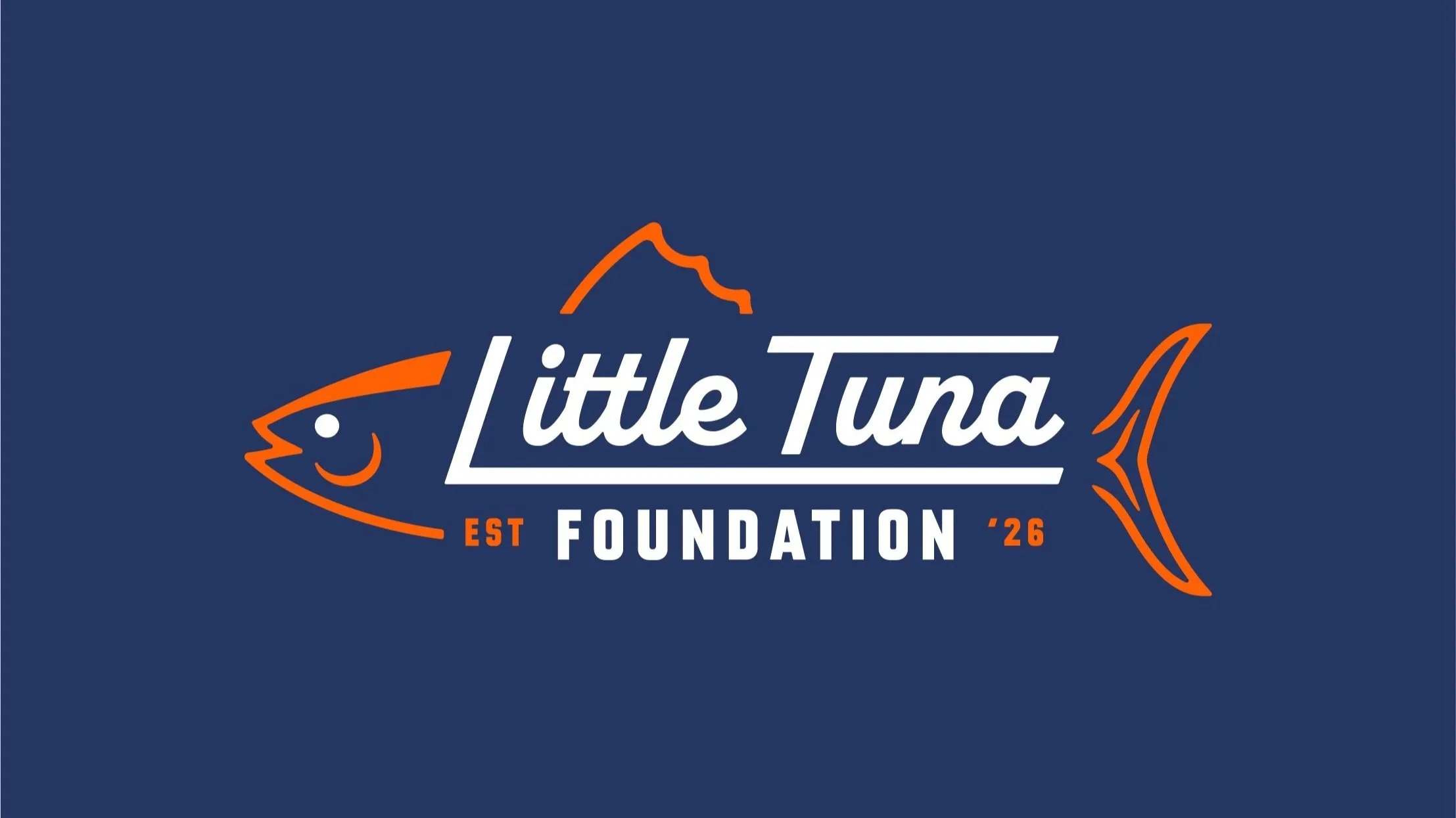 Logo for Little Tuna Foundation with a stylized tuna fish outline, a mountain shape above the text, and 'EST '26' in orange, on a navy blue background.