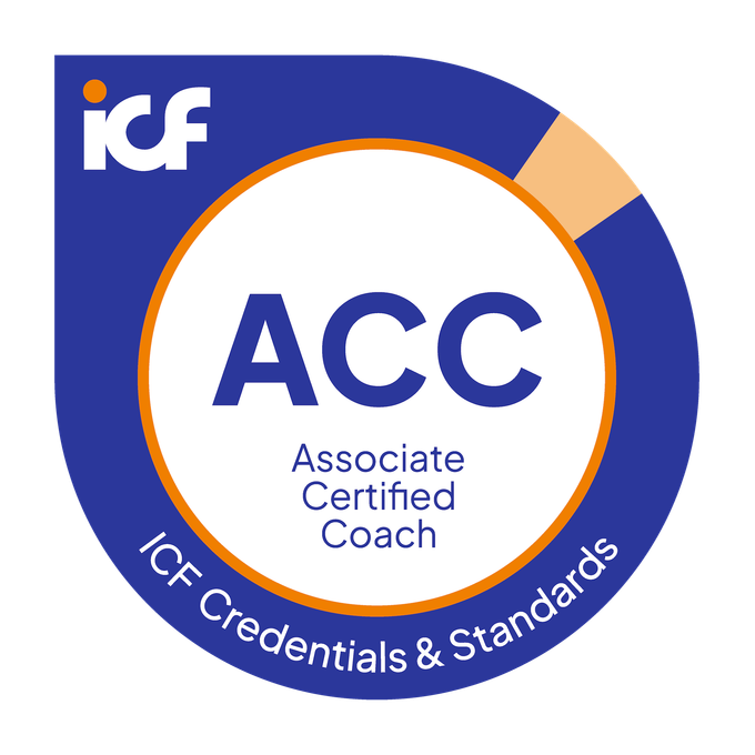 Badge with a blue and orange border, displaying the ICF logo and text indicating Associate Certified Coach (ACC) certification, part of ICF Credentials & Standards.