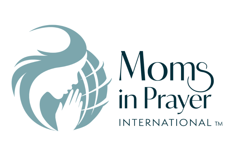 Logo for Moms in Prayer International, featuring a silhouette of a woman praying with a globe in the background.