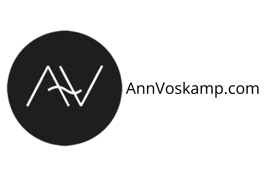Black circular logo with stylized initials 'NA' in the center.