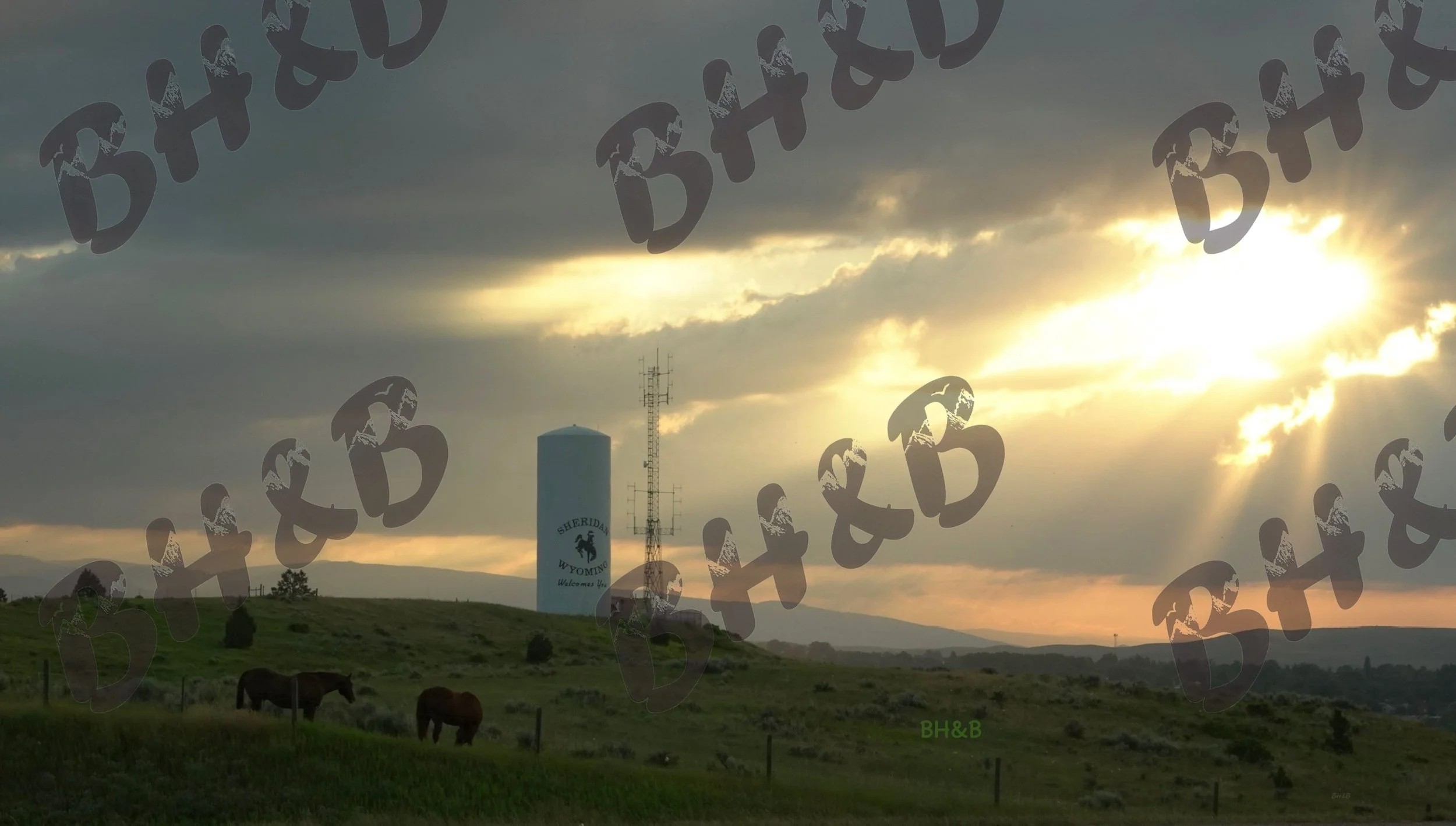 Sheridan Water Tank on Tank Hill during sunset before the construction destroyed this once great community sledding hill.  Ain't progress great?!