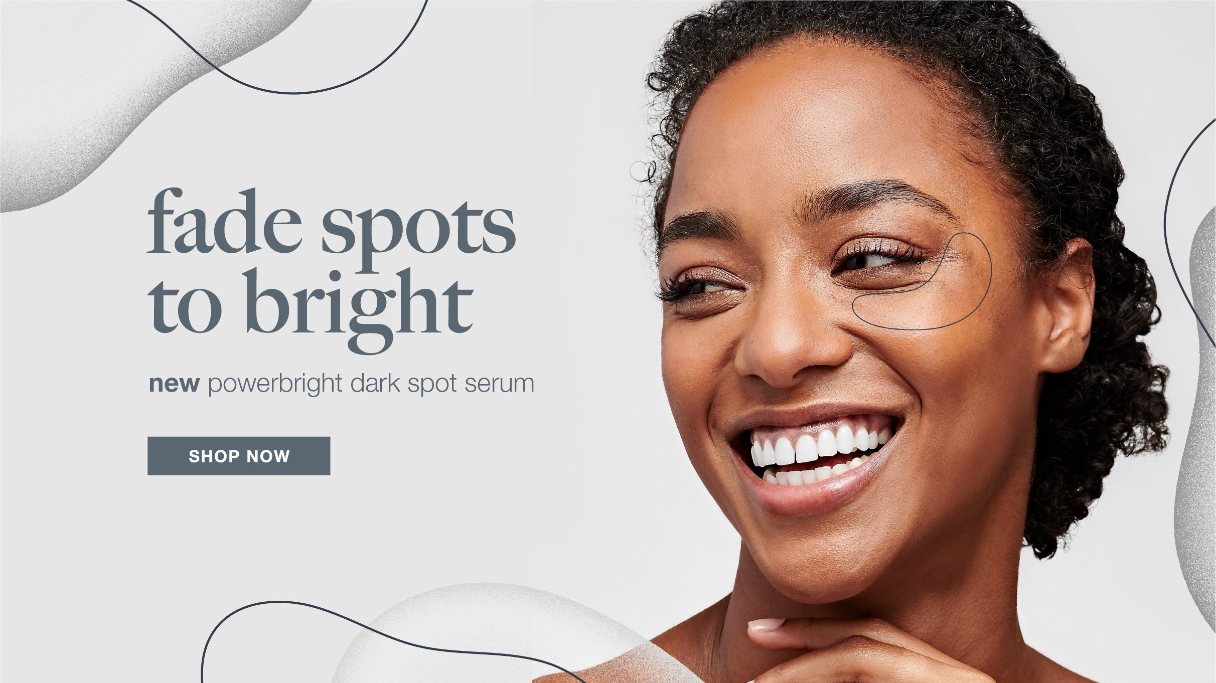 Smiling woman with dark curly hair promoting fade spots to bright skincare serum.