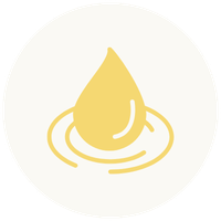A yellow drop of liquid with ripples around it on a white background.