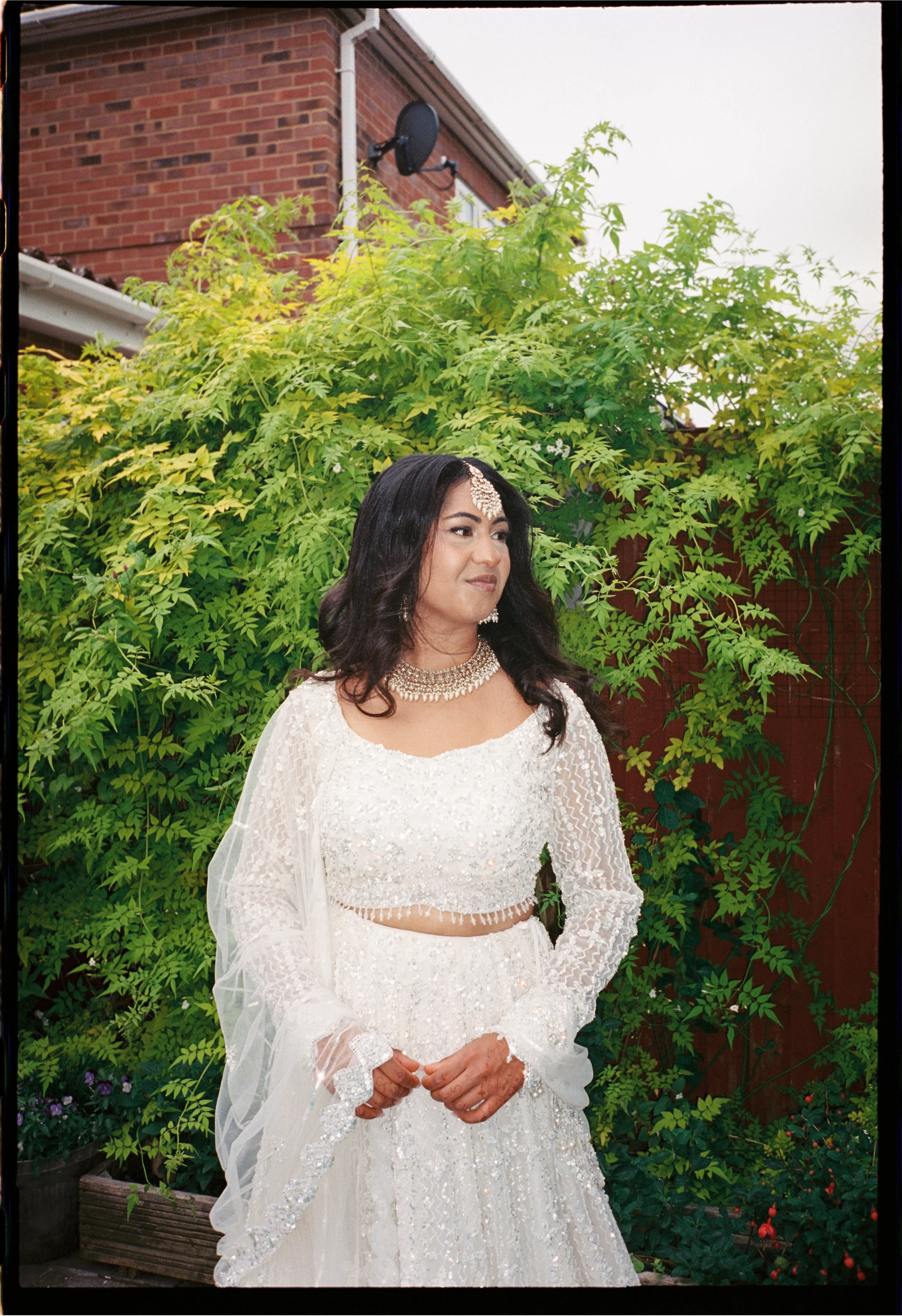 A-woman-in-white-bridal-lengha