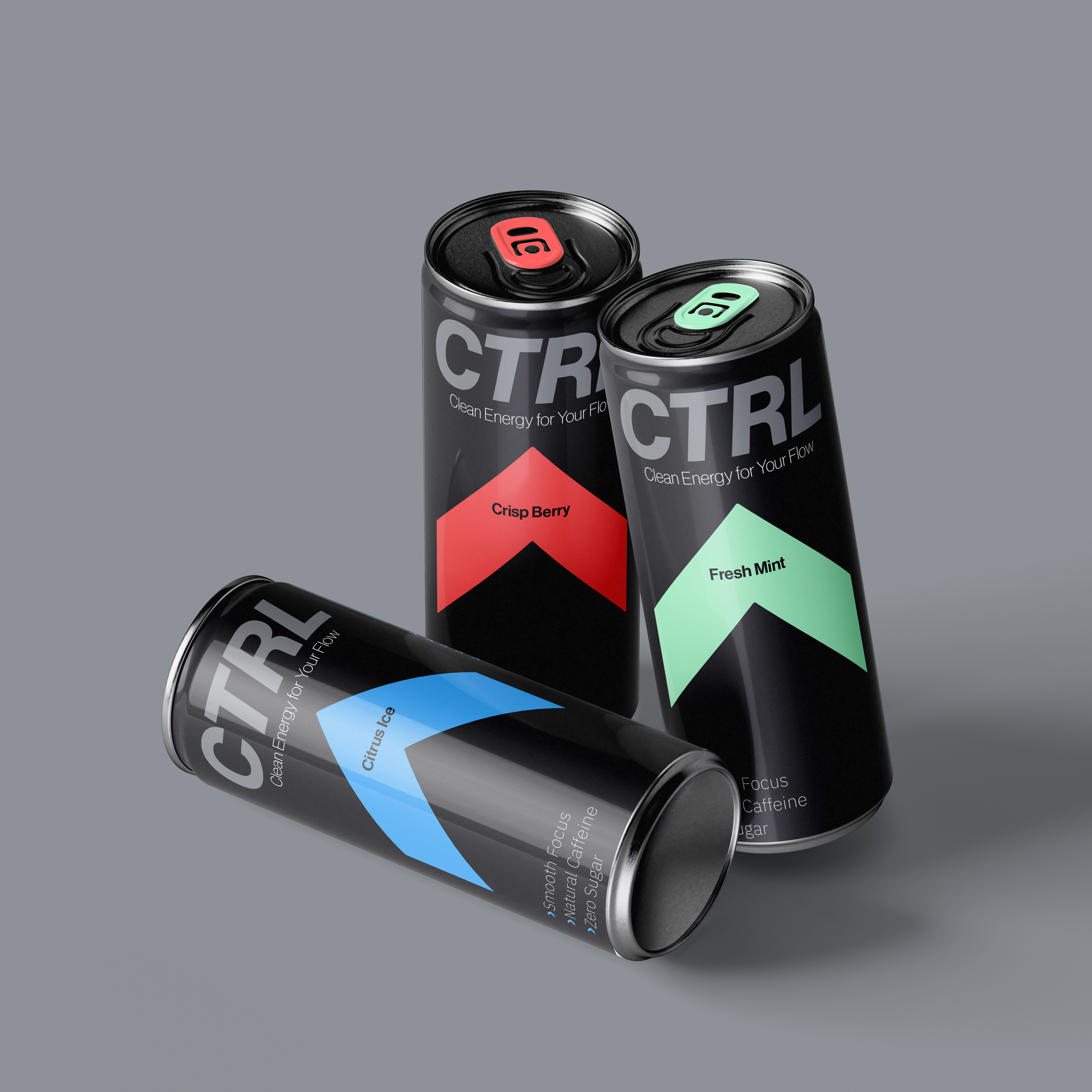 Three cans of energy drink with black labels featuring colorful diamond-shaped accents and flavor names, placed on a gray background.