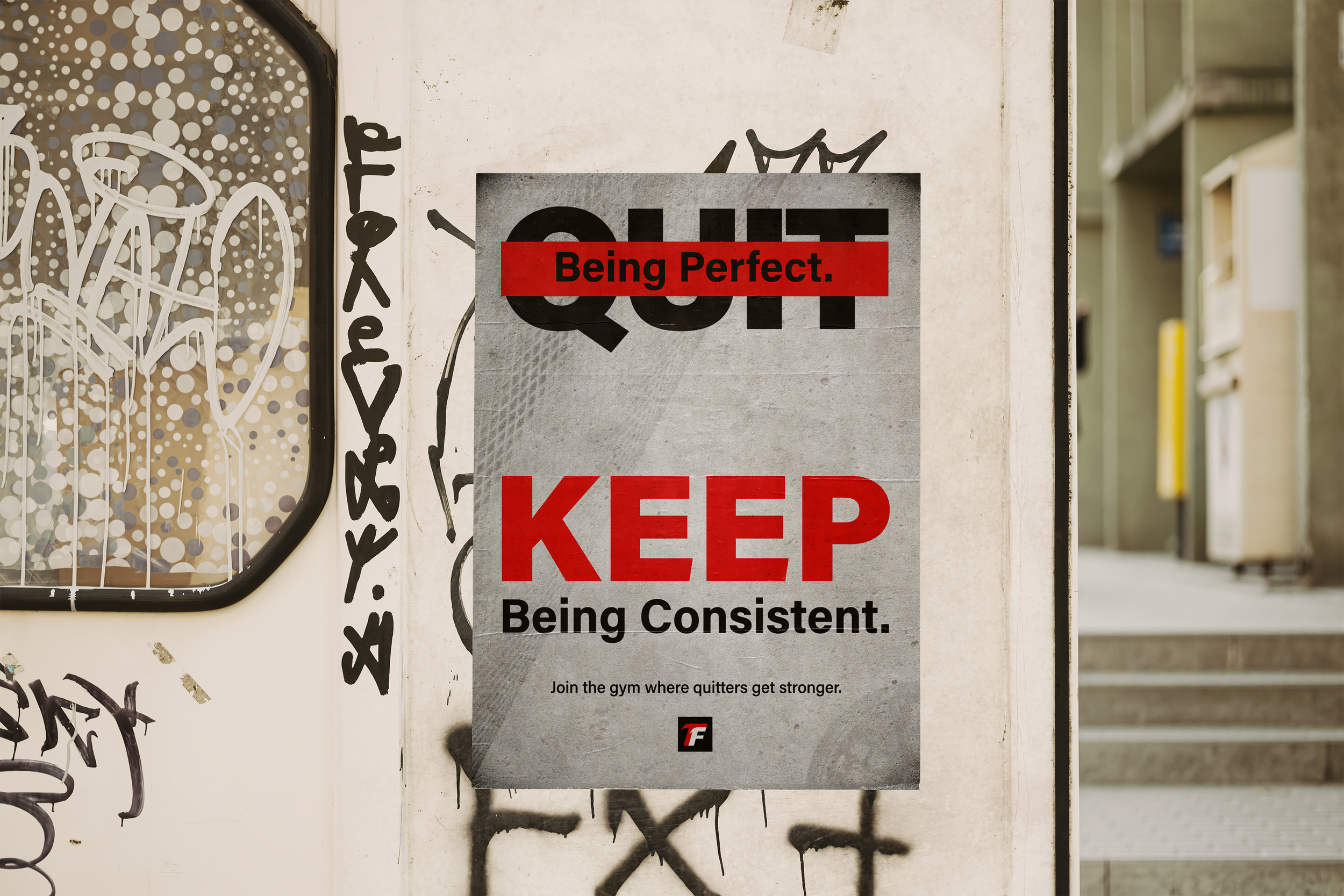 A metal sign on a wall that reads, "Keep Being Perfect." with a background of graffiti and dots on the left side and a glimpse of a hallway or outdoor area on the right side.
