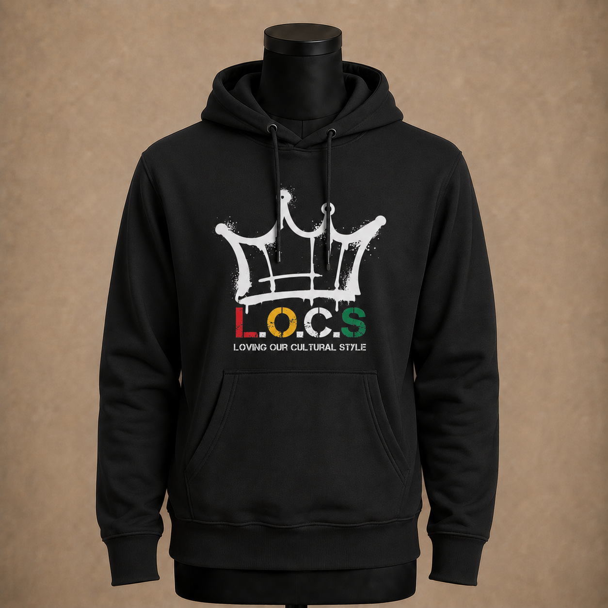 Black hoodie featuring a white graffiti-style crown graphic, with the letters L.O.C.S in red, yellow, and green, and the phrase "Loving Our Cultural Style" underneath.