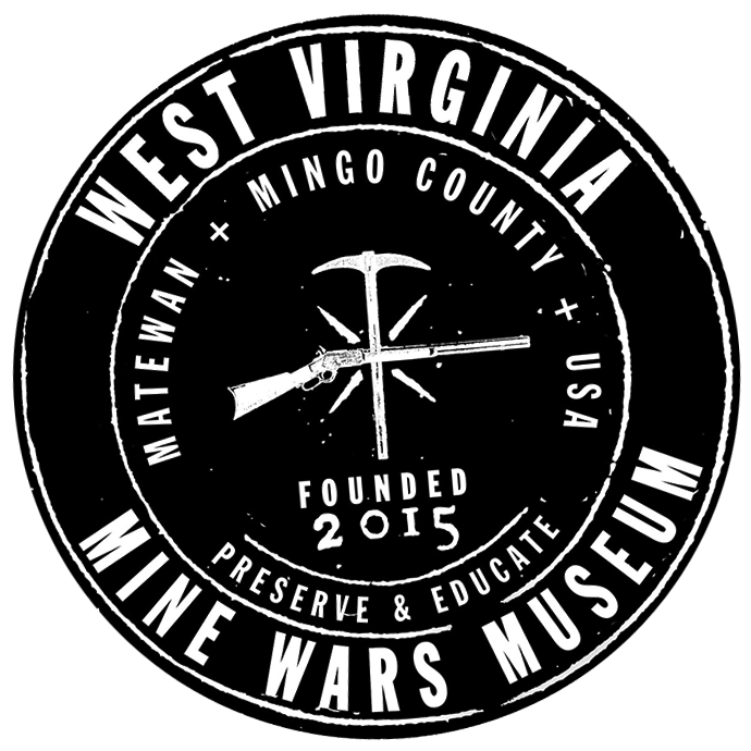 Logo for the Mine Wars Museum in West Virginia featuring a pickaxe and soil shovel crossed, with the text 'West Virginia Mine Wars Museum', 'Mingo County', 'Matewan Mingo County USA', 'Founded 2015', and 'Preserve & Educate' surrounding the graphic.