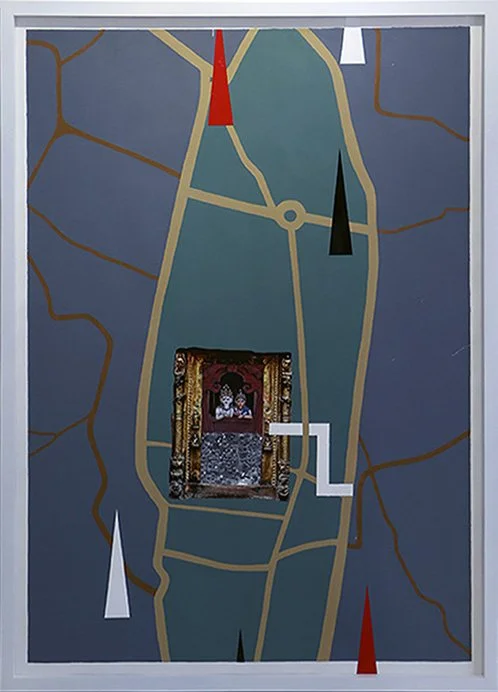 A painted map on a door with various colored cones and a small framed religious or culturally significant image at the center.