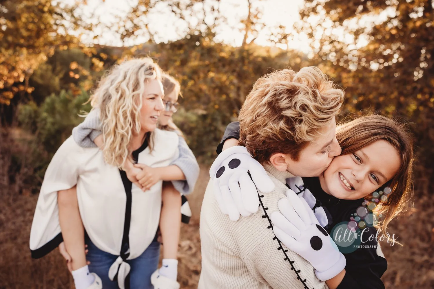 Family of four at a photo shoot in San Diego, CA.