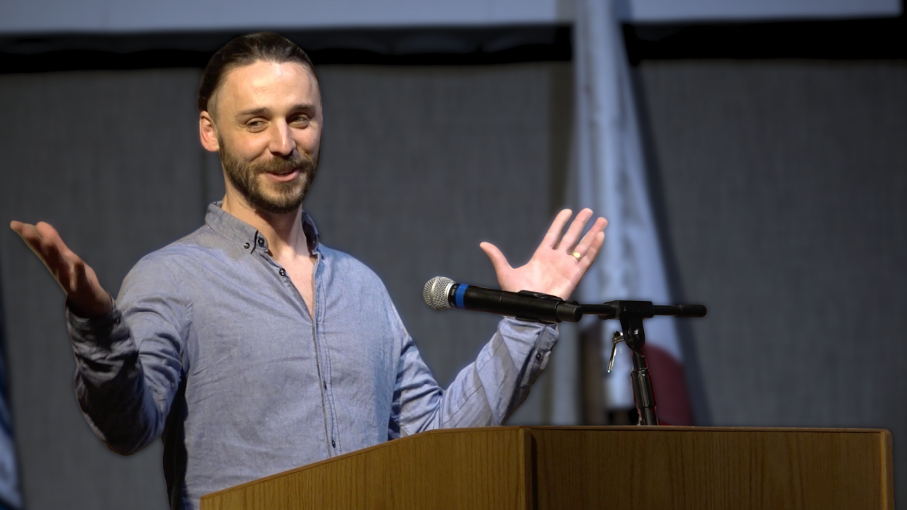 Nathan Hassall, Malibu Poet Laureate Emeritus and Founder of The Poetry Vessel, photographed during a speech or presentation in City Hall in Malibu, California.