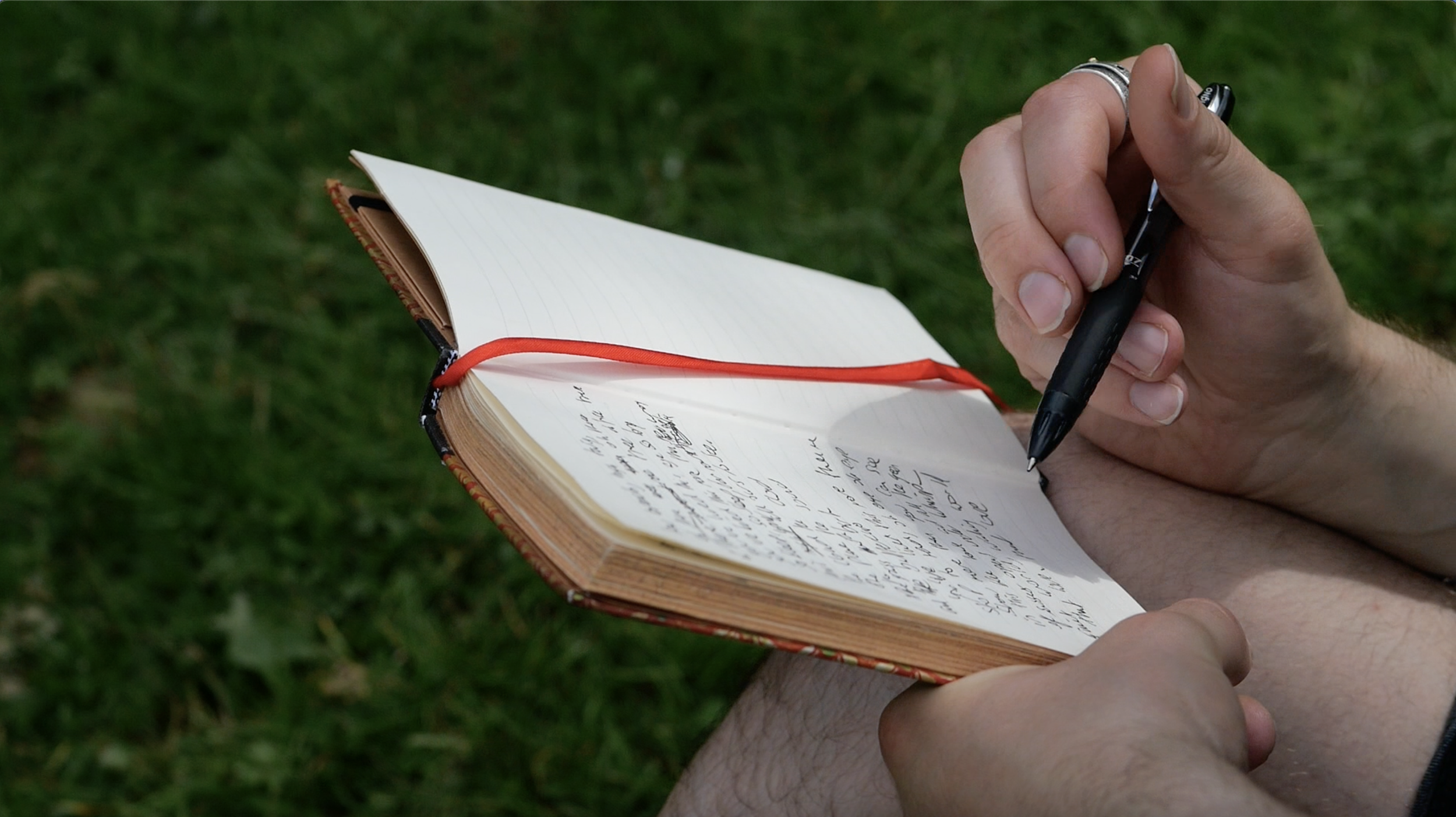 Nathan Hassall writing in notepad