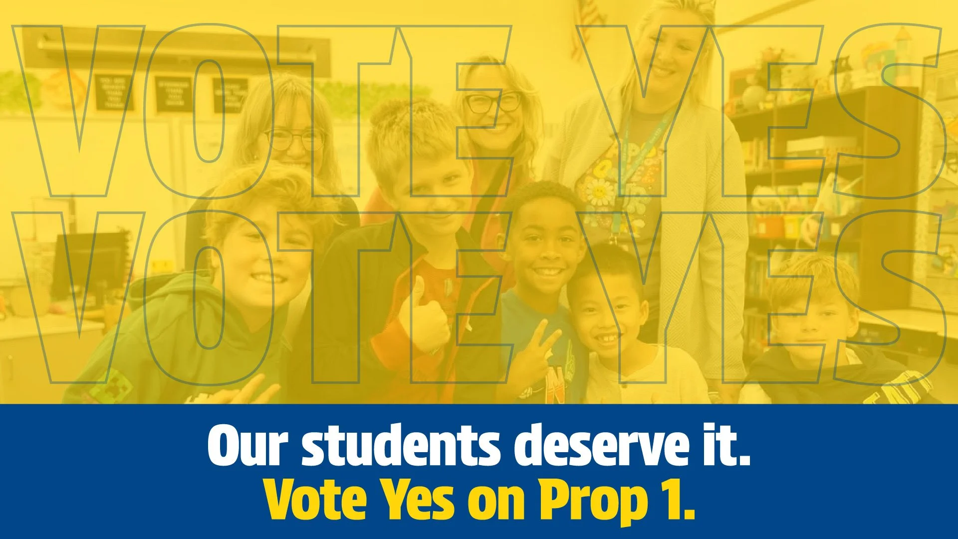 Group of young students and two women smiling and posing together inside a classroom or library, with shelves and computers in the background, overlaid with yellow text reading "VOTES" and a blue banner with white and yellow text encouraging to vote yes on Prop 1.