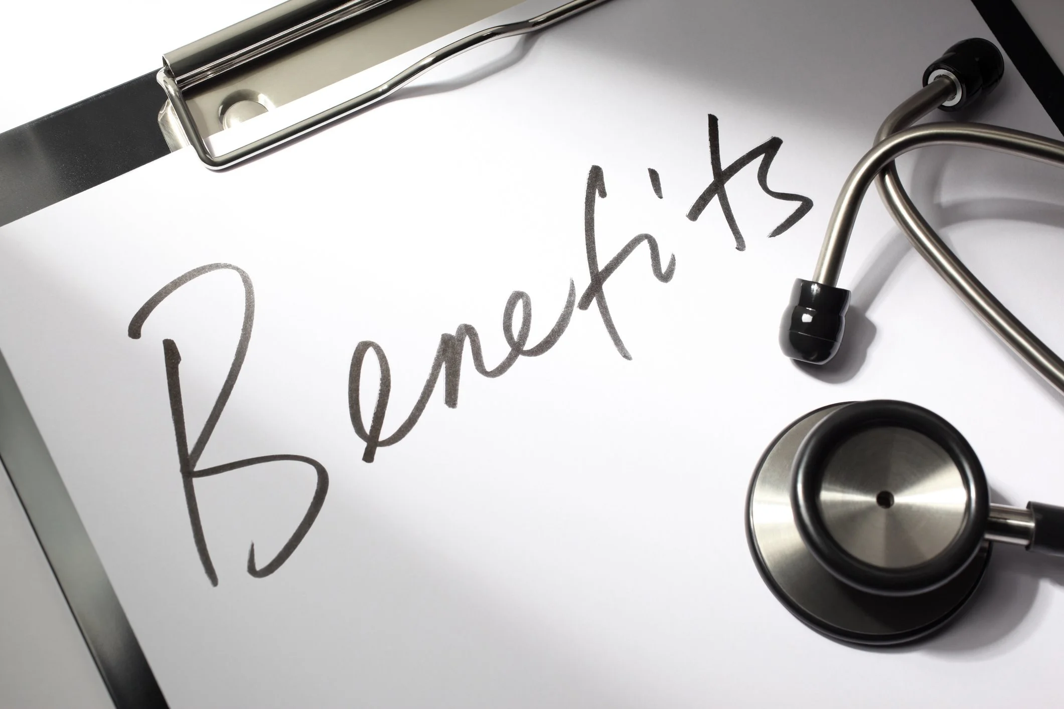 A stethoscope and a clipboard with a handwritten message that says 'Be Thankful'