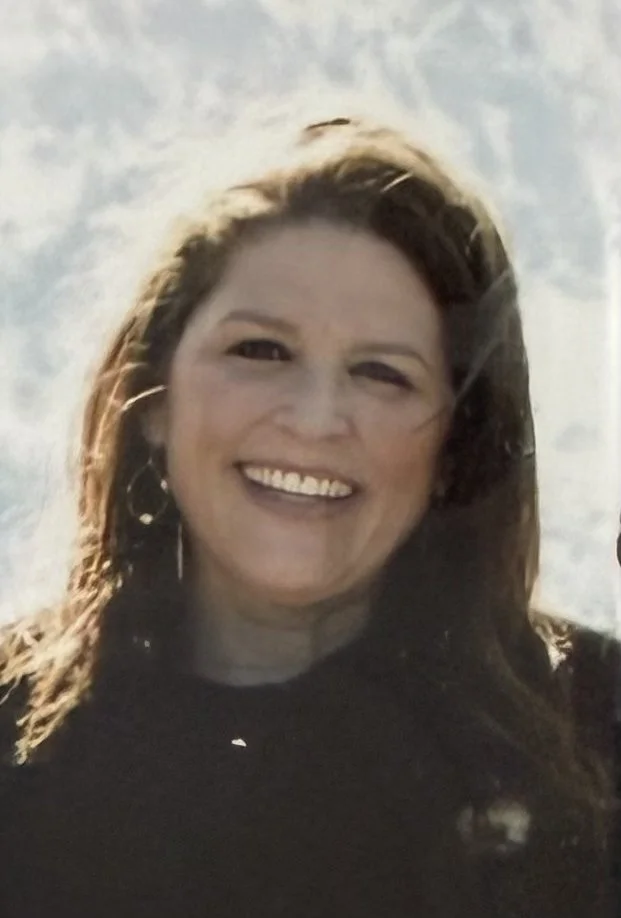 Headshot of Montana woman in front of mountains.