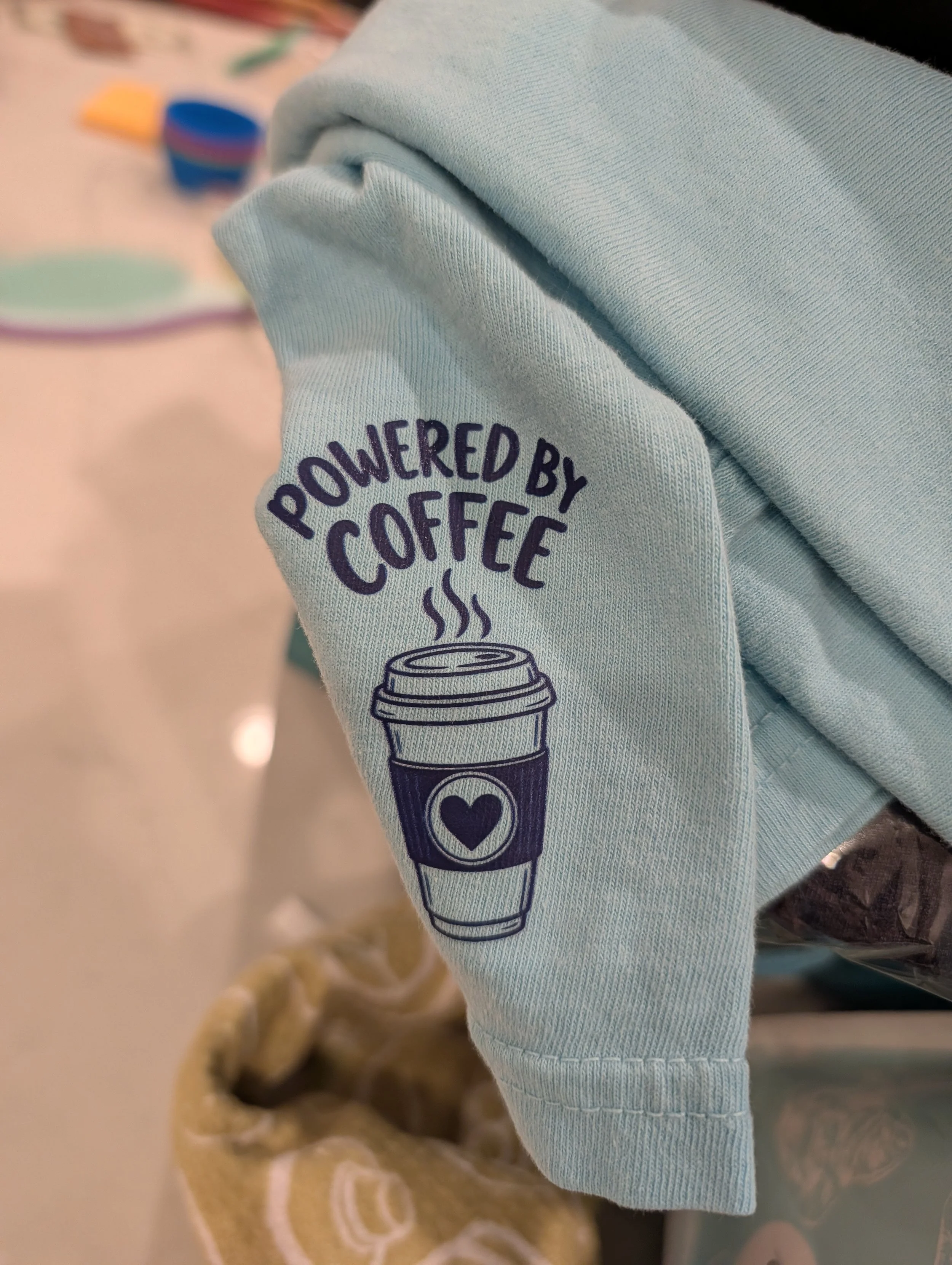 This logo goes on a lot of shirts. Always fun to have a peek-a-boo sleeve design. 