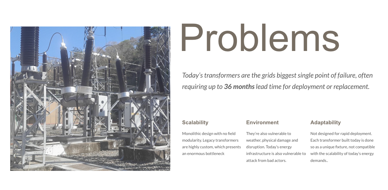 Photograph of electrical transformers and equipment at an outdoor substation with trees and blue sky in the background.