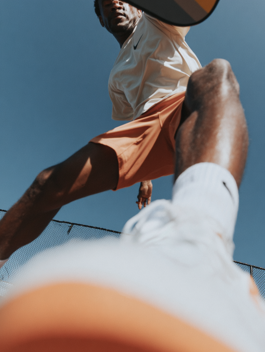 u9767649428_Cinematic_close-up_action_photo_of_a_pickleball_p_c41d187b-5a7c-41fa-bc36-3091e0c26089_1.png