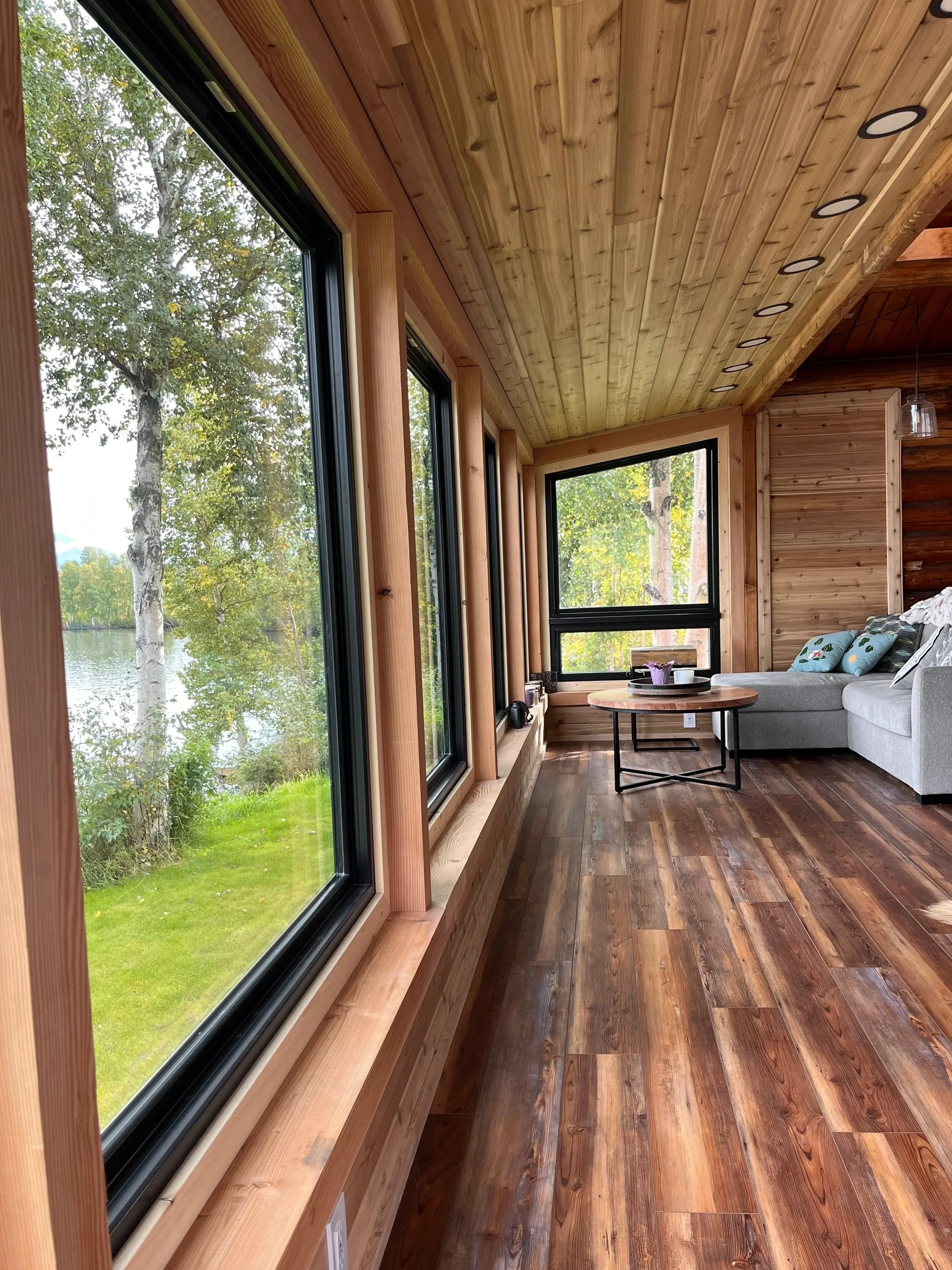 Remodel of atrium, heated floors, window installation, log cabin wall removal, custom framing by Cando General Contracting, Andrew France Owner & Operator