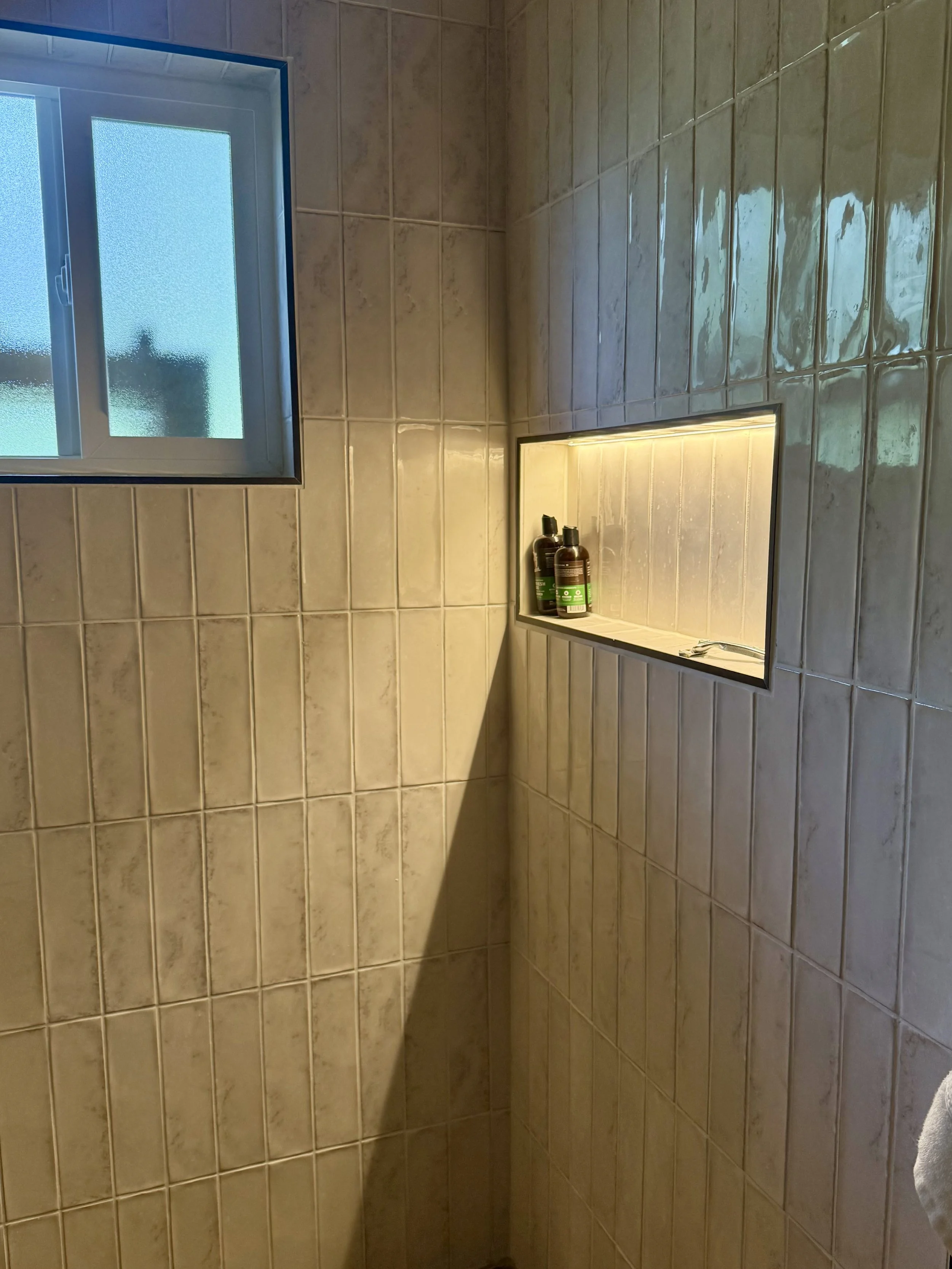 Custom bathroom niche, custom under-glow lighting, window instal, shower tile