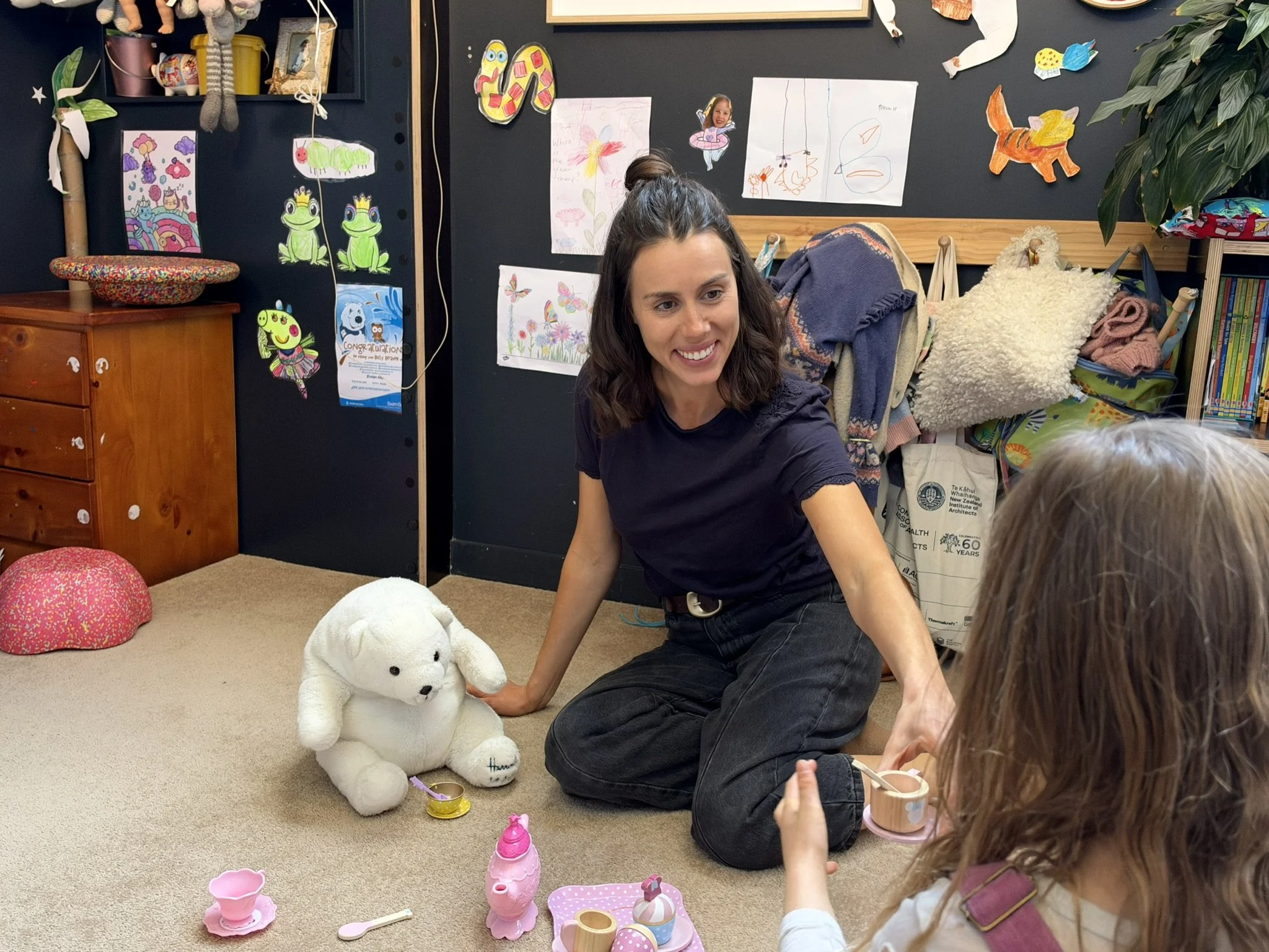 Georgie a Queenstown sleep consultant spending time playing 'cups of tea' with her daughter.