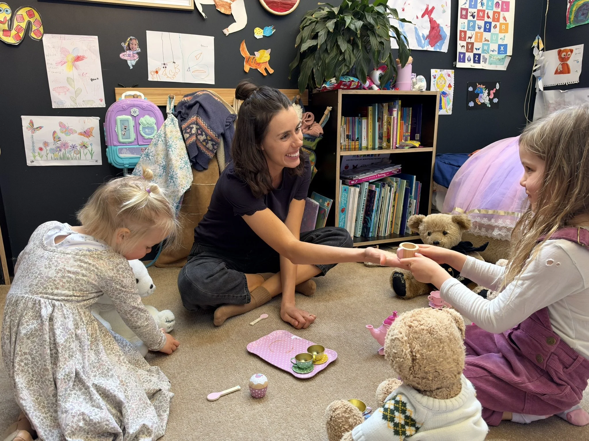 Georgie a Queenstown sleep consultant spending time playing 'cups of tea' with her daughter.