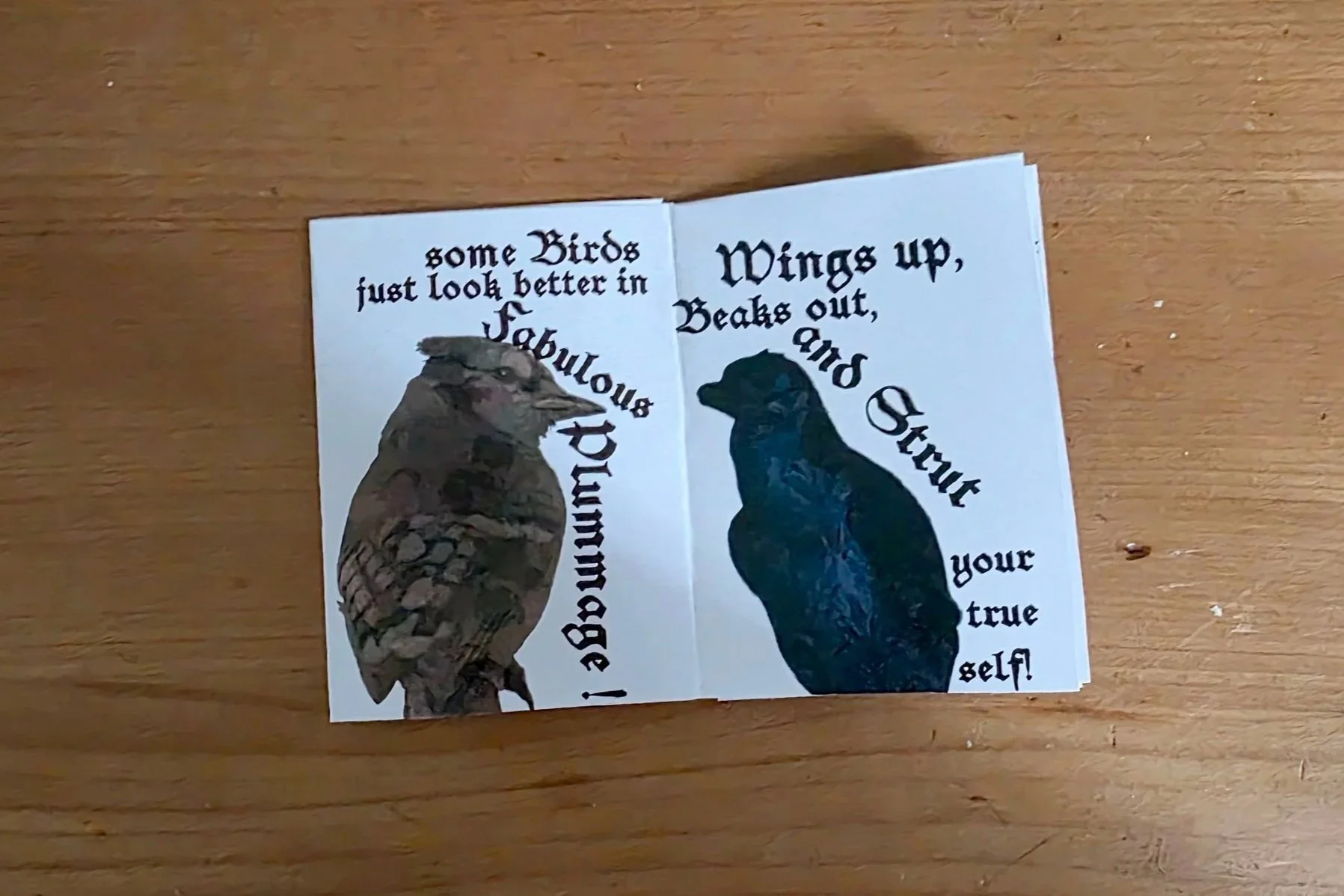 A paper with illustrations of a bird and a dog, with decorative text around them. The bird has brown and gray feathers, and the dog appears to be a black lab.