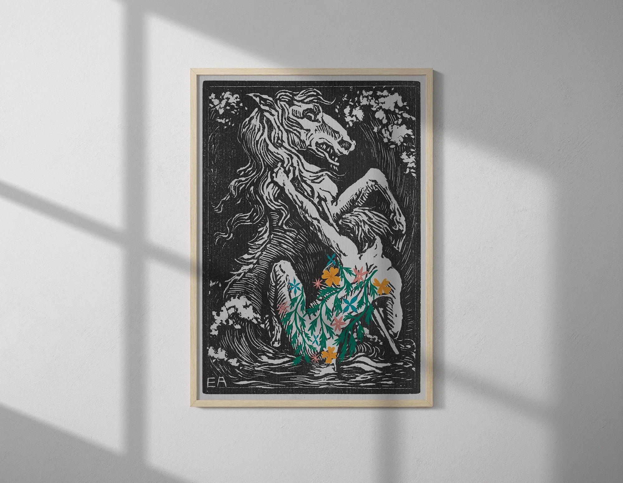 A framed black-and-white artwork of a roaring lion with flowing mane, set against a textured background, with colorful floral accents at the bottom.