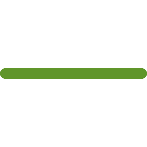 Close-up of an electronic circuit board with various components including a green connector and black chips.